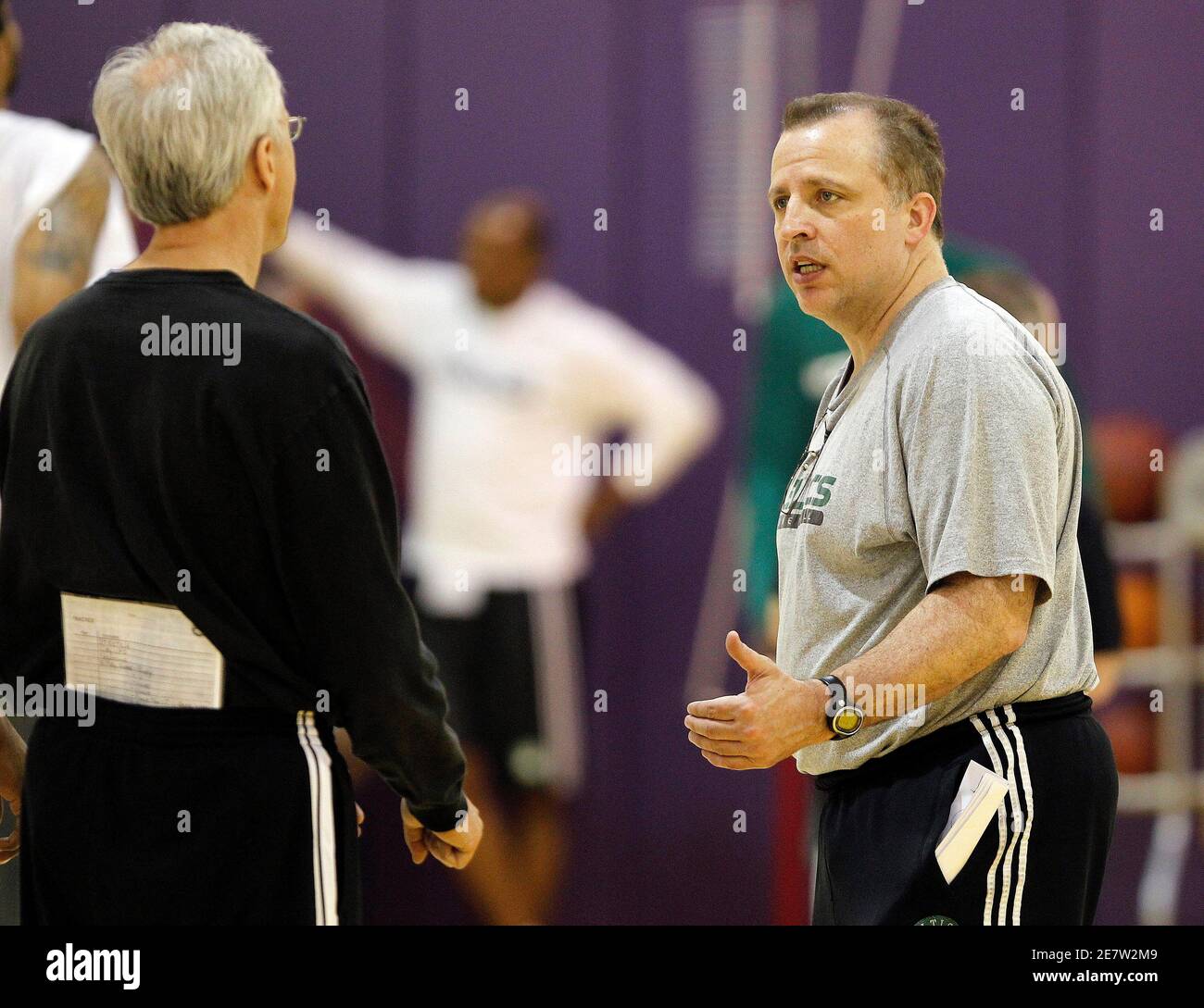 Boston Celtics assistant coach Tom Thibodeau (R) talks with assistant coach Kevin  Eastman during practice to prepare for Game 2 against the Los Angeles  Lakers in the 2010 NBA Finals basketball series