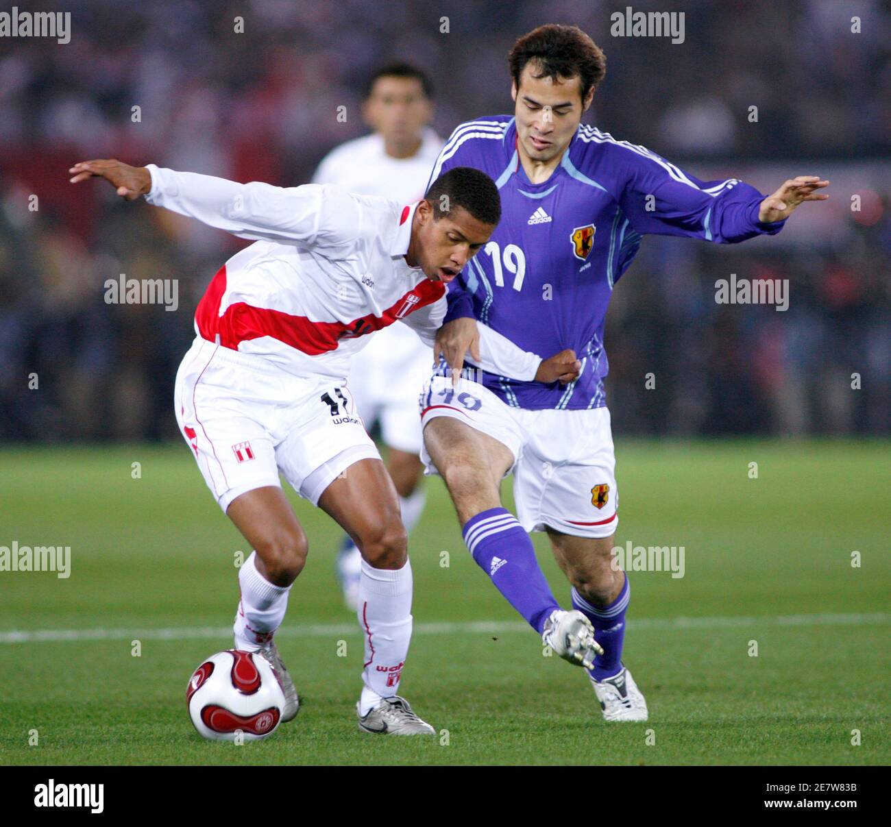 Japan S Naohiro Takahara 19 Challenges Peru S Alexander Sanchez During Their International Friendly Soccer Match In Yokohama South Of Tokyo March 24 07 Reuters Kiyoshi Ota Japan Stock Photo Alamy