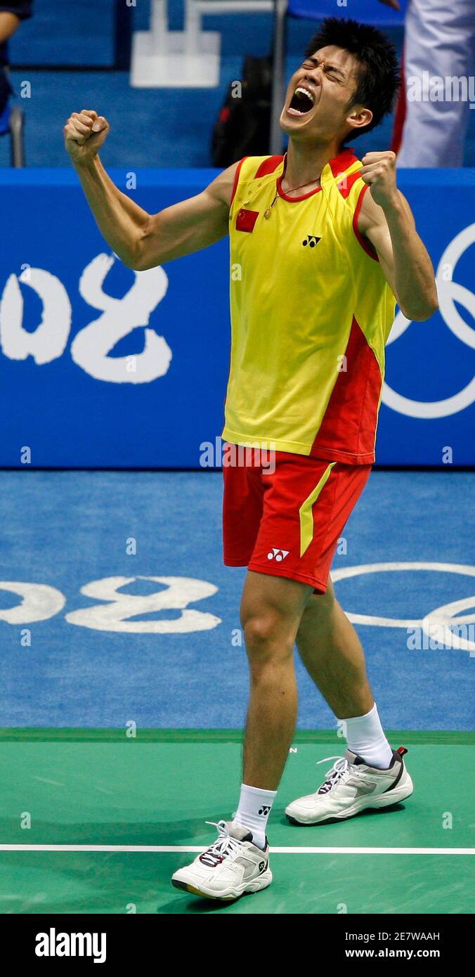Lin Dan (L) of China reacts after winning the gold medal for the men's  badminton singles final match against Lee Chong Wei of Malaysia during the  Beijing 2008 Olympic Games August 17,