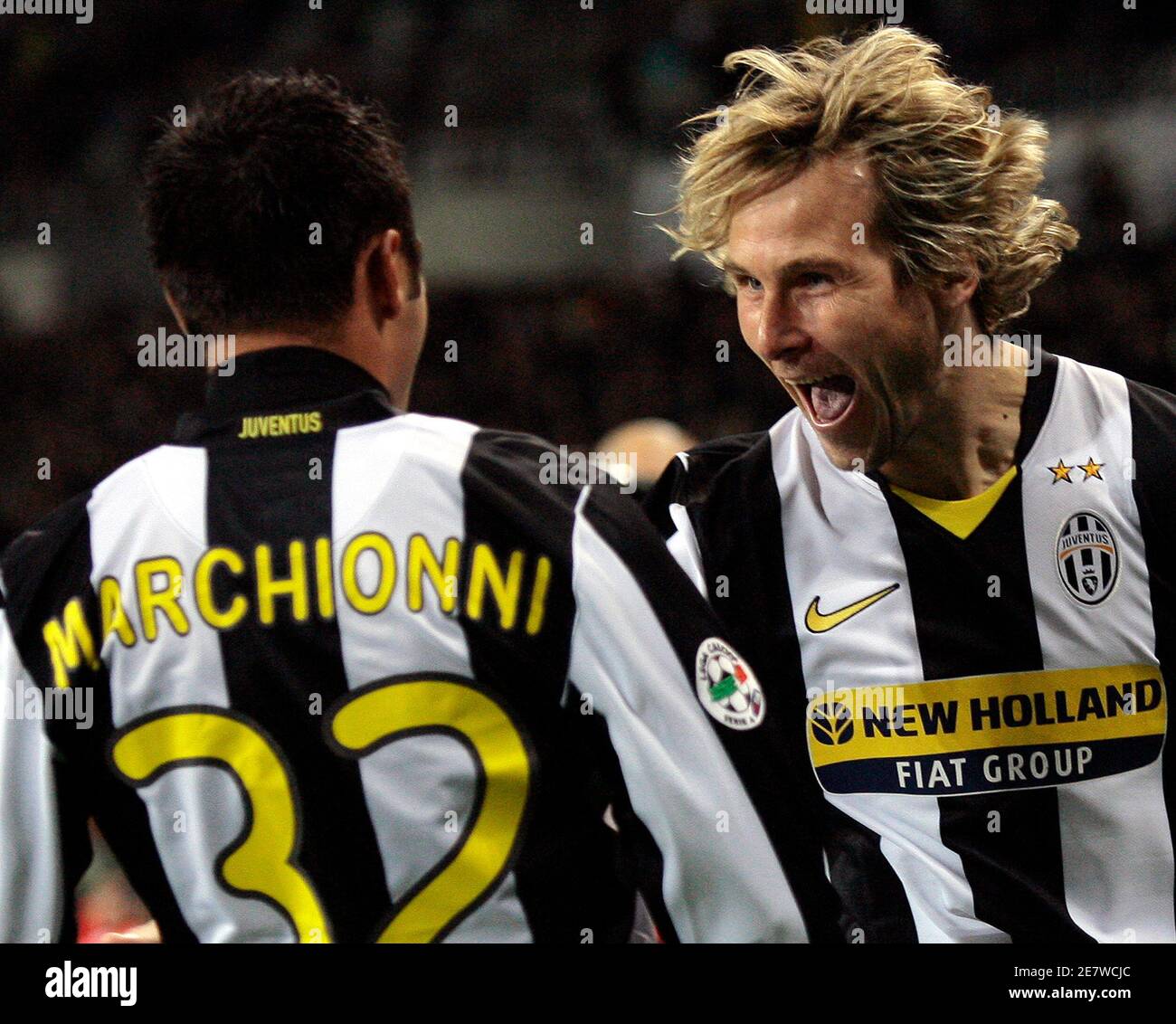 Juventus's Marco Marchionni (L) celebrates with his team mate Pavel Nedved after scoring a second goal against AS Roma during their Italian Serie A soccCer match at the Olympic stadium in Turin November 1, 2008. REUTERS/Alessandro Garofalo (ITALY) Stock Photo