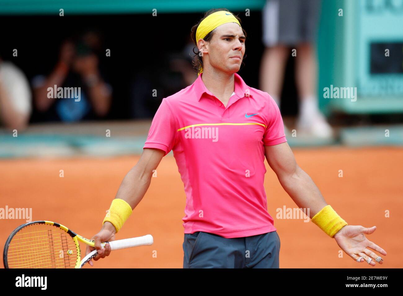 Conquest Consult Mutual Rafael Nadal of Spain reacts during his match against Robin Soderling of  Sweden at the French Open tennis tournament at Roland Garros in Paris May  31, 2009. REUTERS/Charles Platiau (FRANCE SPORT TENNIS