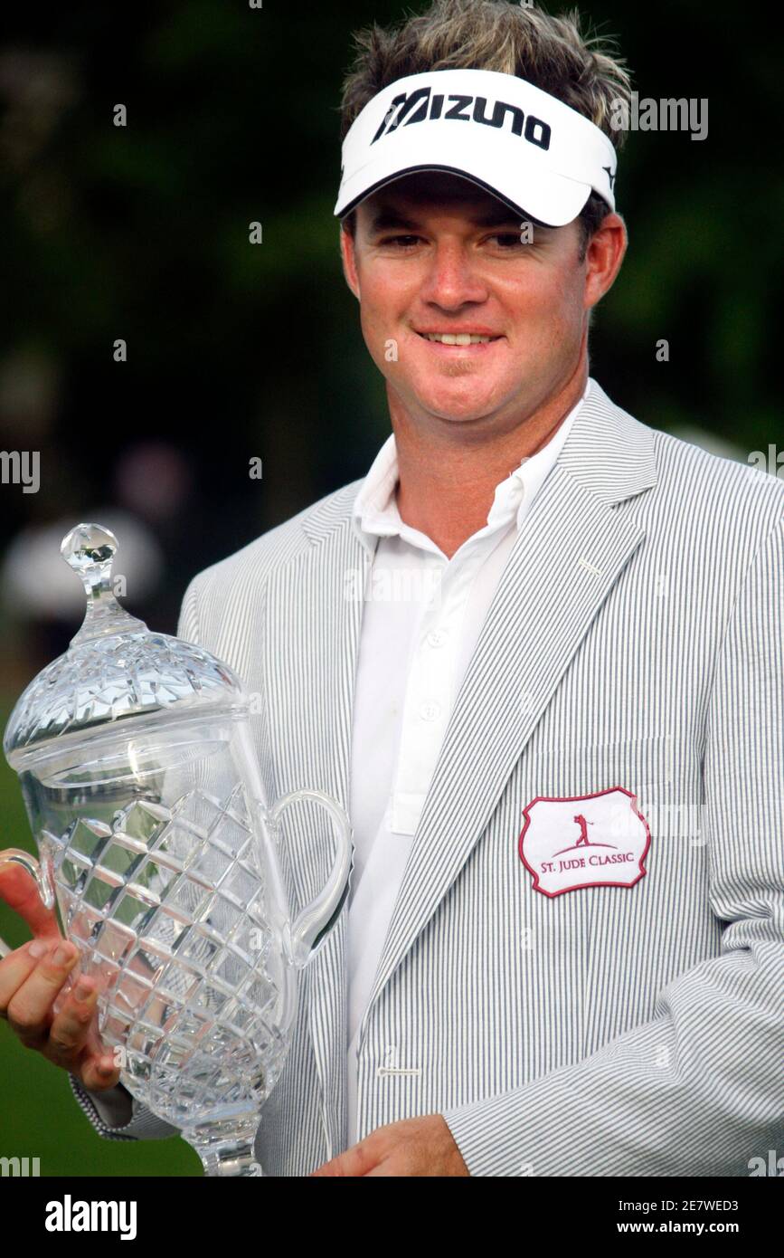 Brian Gay poses with the championship trophy following the final round of the St. Jude Classic golf tournament at TPC Southwind in Memphis, Tennessee June 14, 2009.   REUTERS/Nikki Boertman    (UNITED STATES SPORT GOLF) Stock Photo
