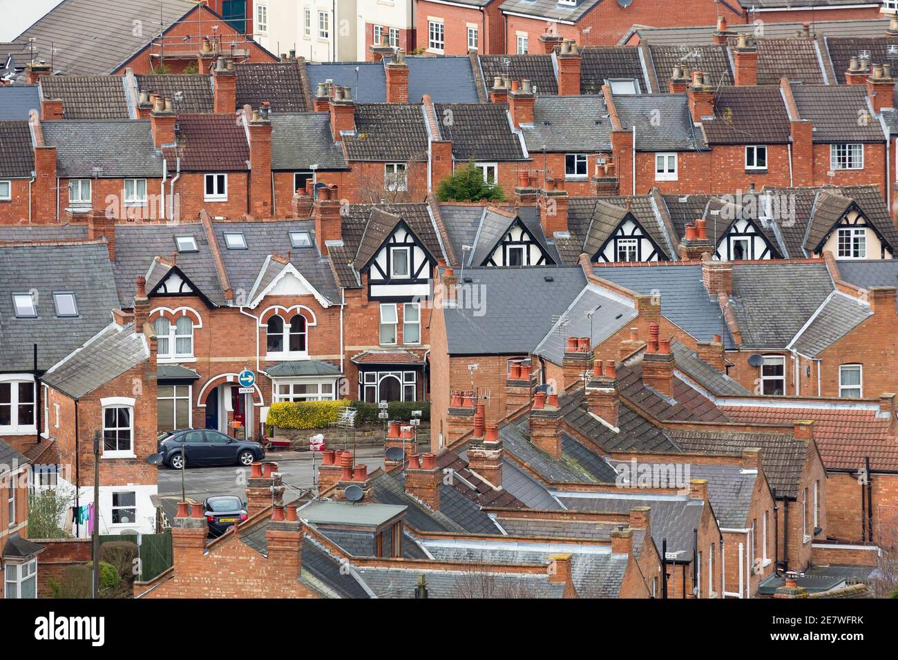 Rows of old suburban terraced houses in an English town. Warwick, UK Stock Photo