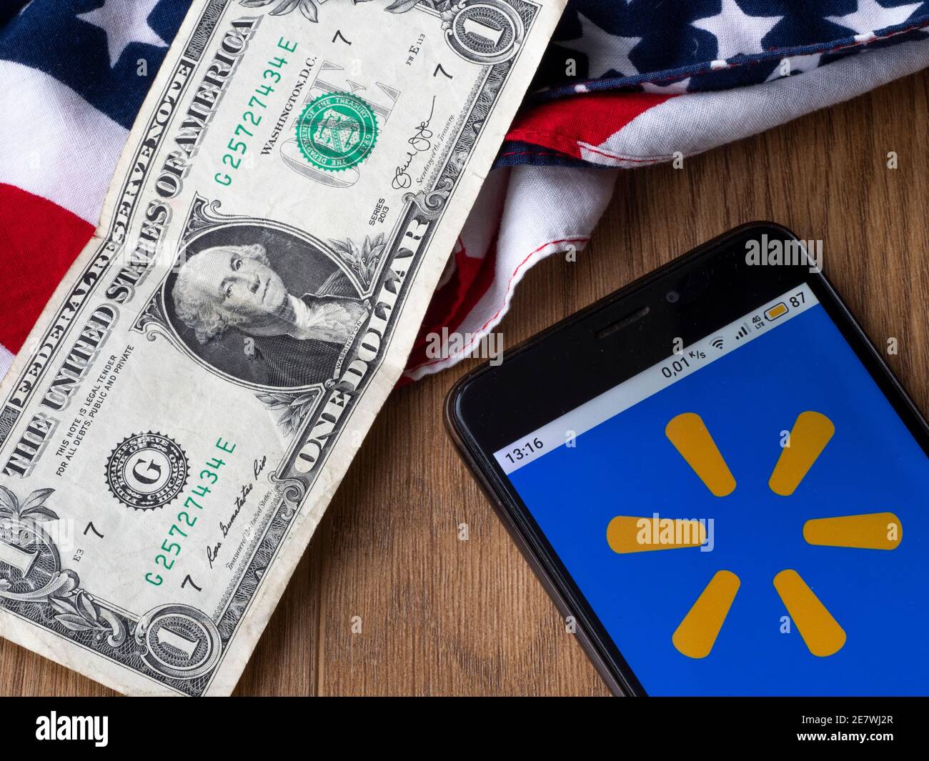 In this photo illustration a Walmart logo is seen displayed on a smartphone. Stock Photo