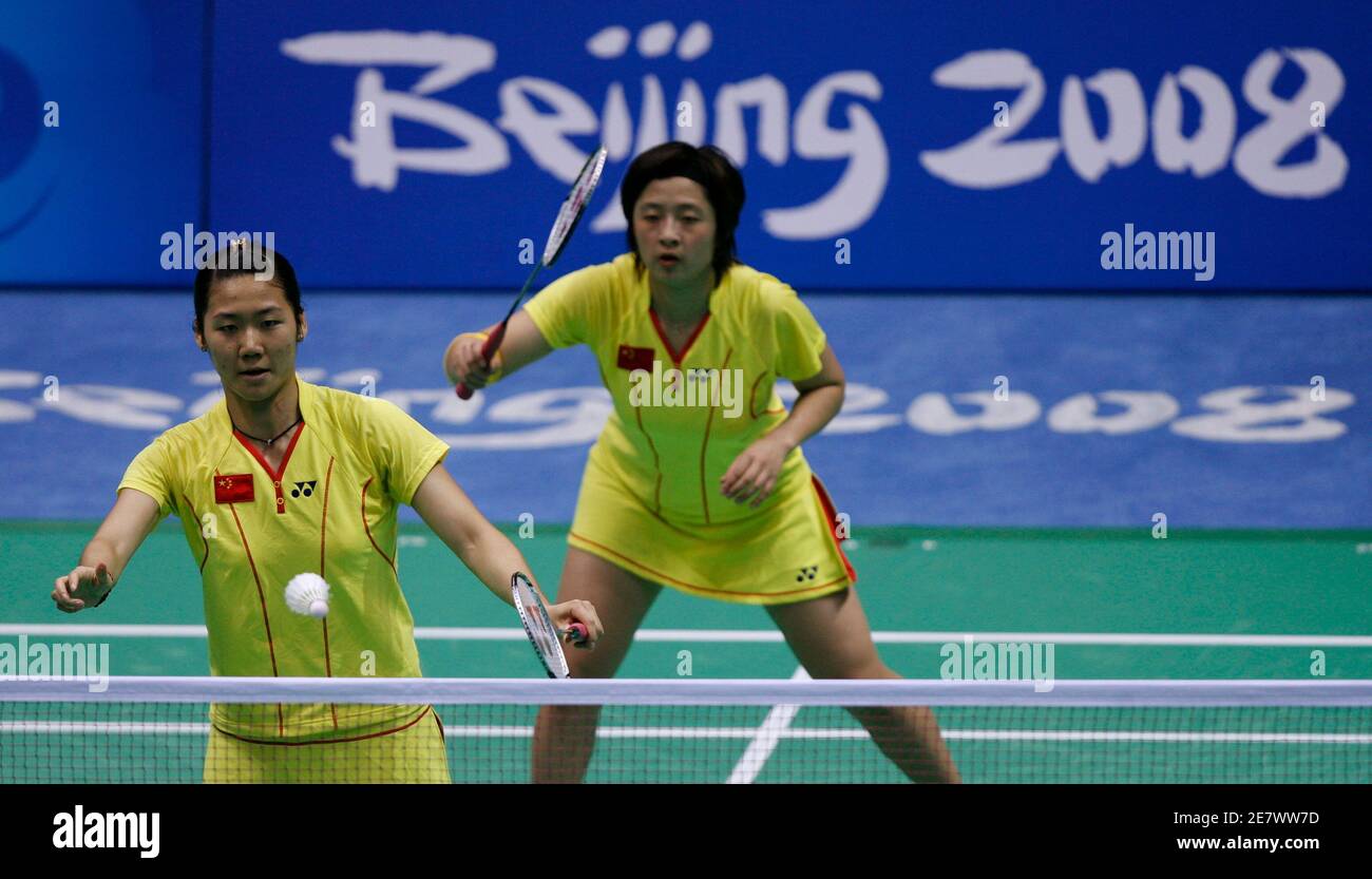 Wei Yili of China (front) hits a shot in front of teammate Zhang Yawen during their women's doubles semi-final badminton match against compatriots Yu Yang and Du Jing at the Beijing 2008 Olympic Games, August 13, 2008.     REUTERS/Beawiharta (CHINA) Stock Photo