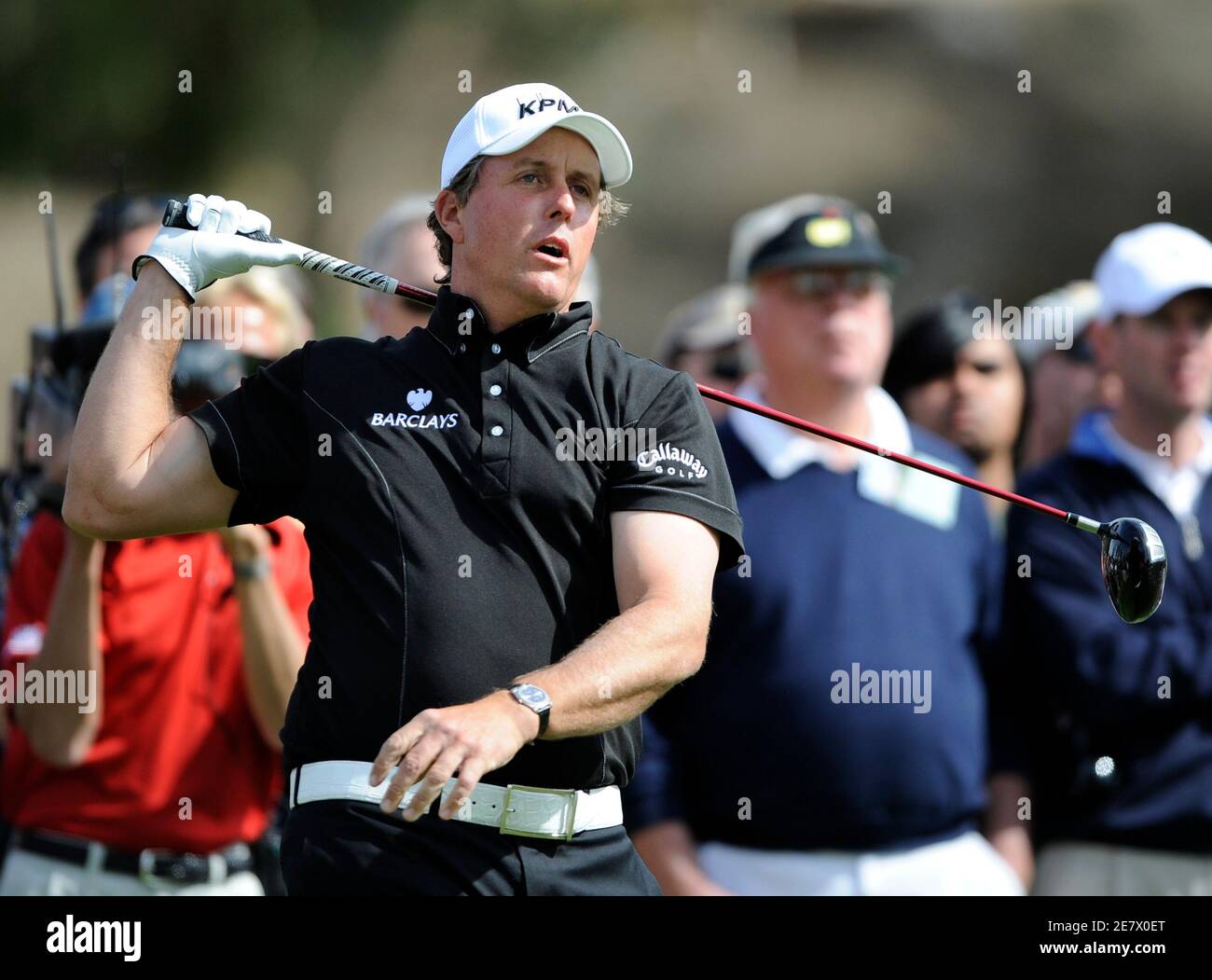 Phil Mickelson of the U.S. reacts to a slice on the second hole, sending his ball into the rough, during the second round of the Northern Trust Open golf tournament in the Pacific Palisades area of Los Angeles February 20, 2009. REUTERS/Gus Ruelas (UNITED STATES) Stock Photo