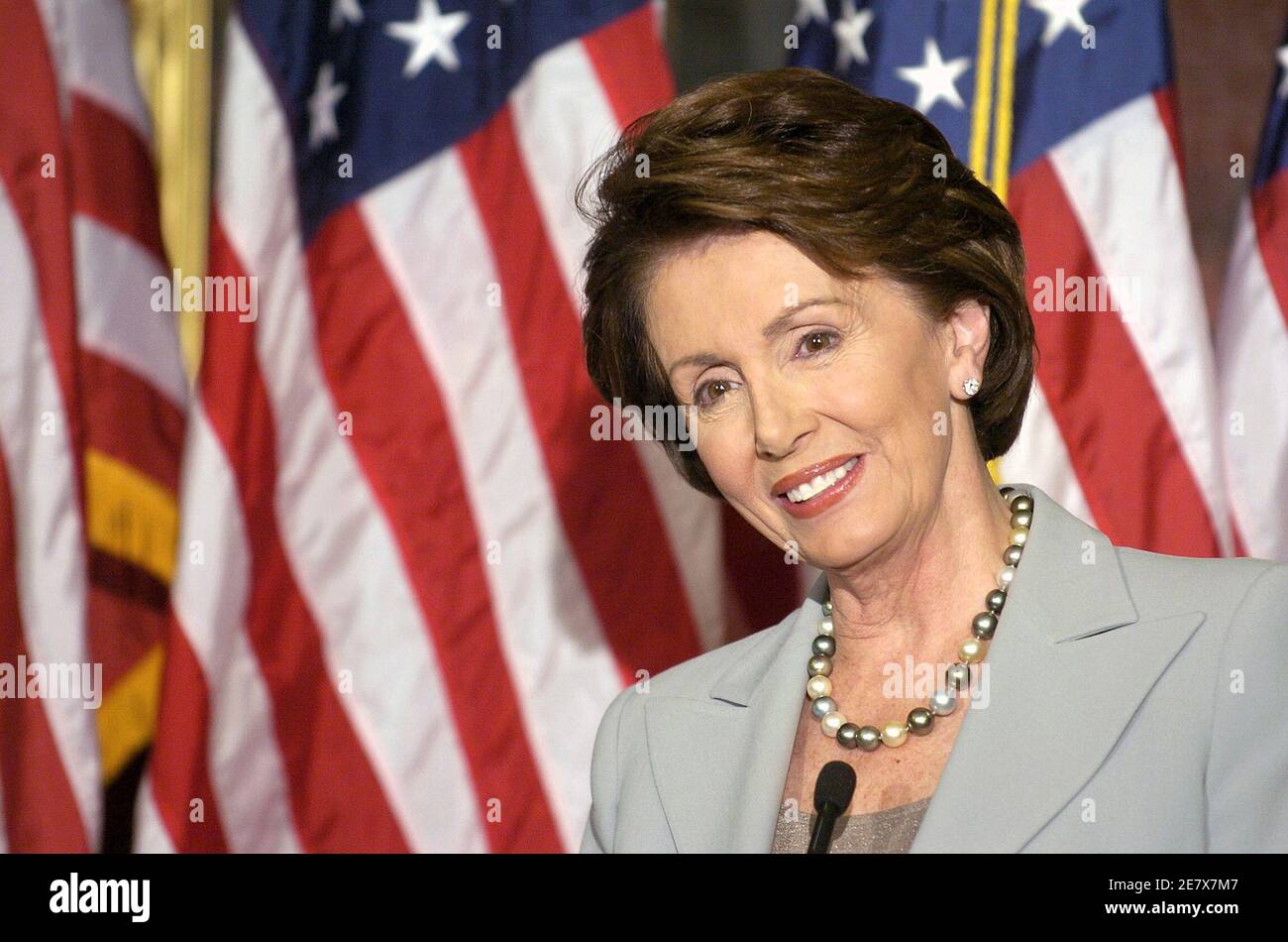 Representative Nancy Pelosi (D-CA), soon to be Speaker of the House in the aftermath of the midterm elections, speaks to the media the day after Democrats took control of the House for the first time in 12 years, on Capitol Hill November 8, 2006.        REUTERS/Mike Theiler  (UNITED STATES) Stock Photo