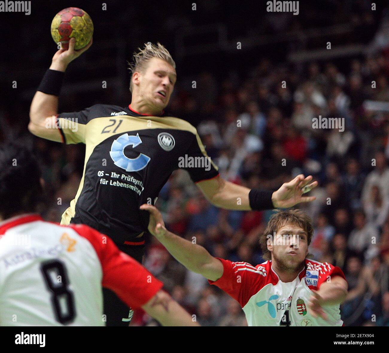 Gabor of Hungary challenges Lars Kaufmann of Germany during their friendly handball match in Budapest January 7, 2007. REUTERS/Laszlo Balogh (HUNGARY Stock Photo - Alamy