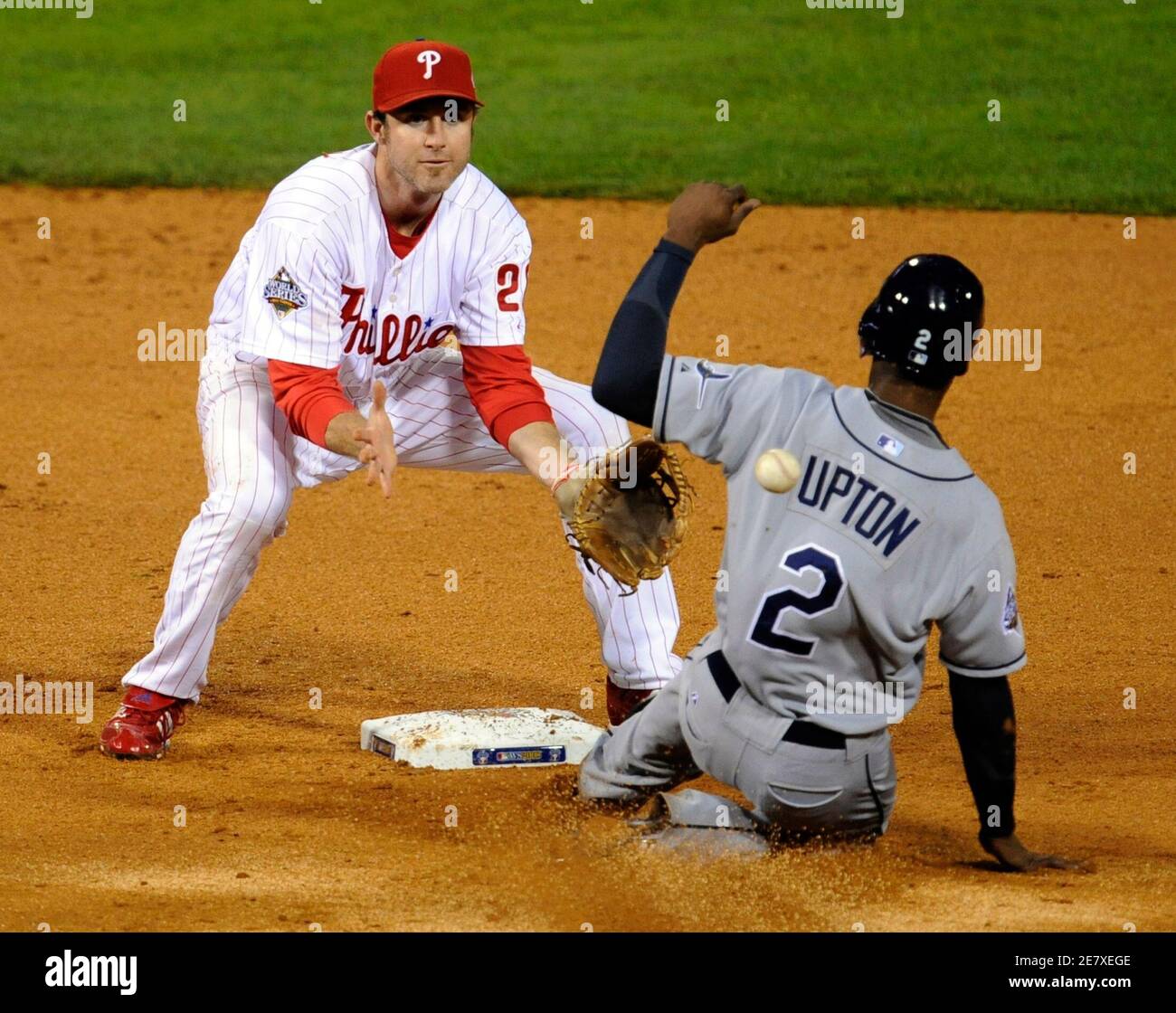 Tampa Bay Rays B J Upton R Steals Second Base In The Sixth Inning Beating The By Philadelphia Phillies Shortstop Chase Utley In Game 3 Of Major League Baseball S World Series In Tampa Bay Rays B J Upton R Steals Second Base In The Sixth Inning Beating The By Philadelphia Phillies Shortstop Chase Utley In Game 3 Of Major League Baseball S World Series In