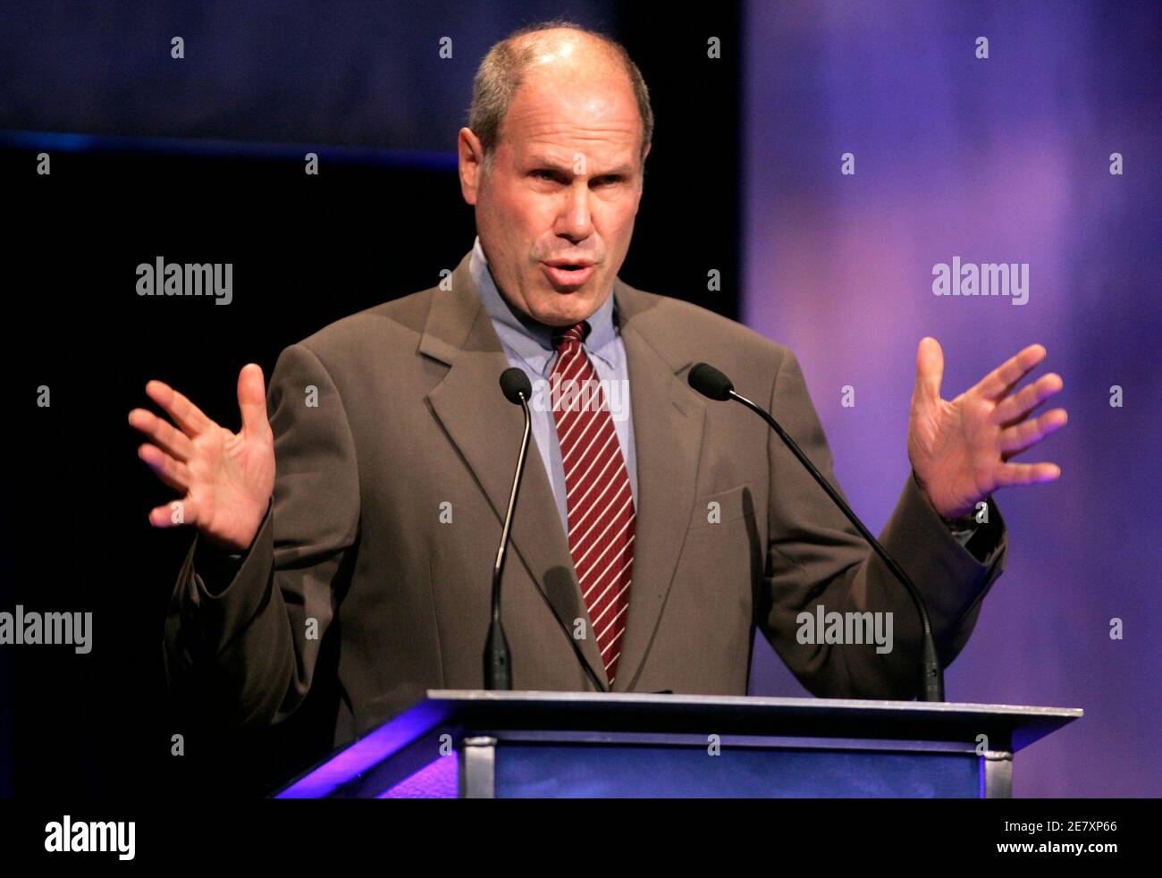 Michael Eisner, CEO of The Walt Disney Company, addresses the Hollywood Radio and Television Society's newsmaker luncheon in Beverly Hills September 27, 2005. Eisner, a prominent leader in the entertainment industry, is stepping down from Disney at the end of September, after leading the company for 21 years. Bob Iger will succeed Eisner. REUTERS/Fred Prouser Stock Photo