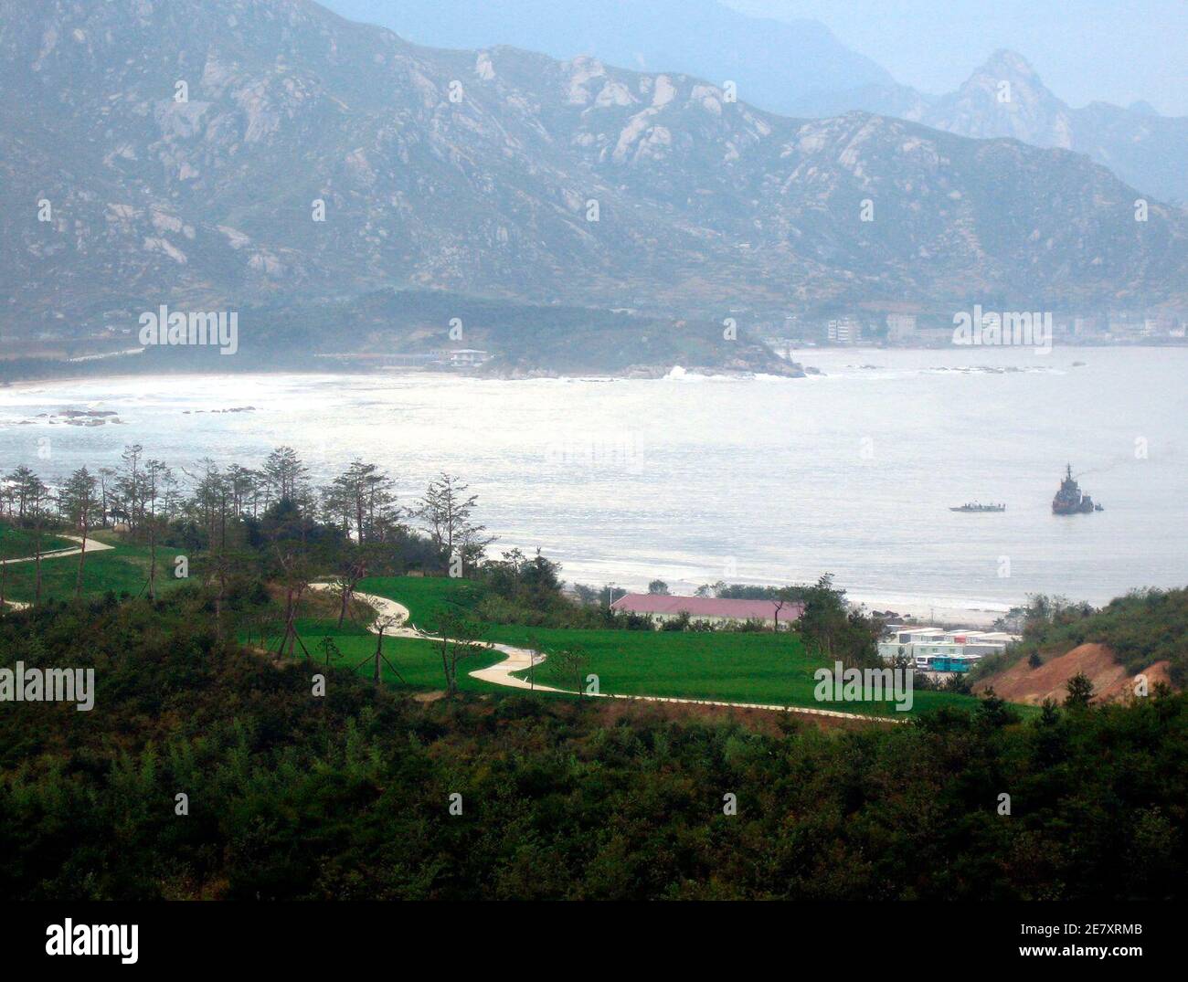 A view of the Diamond Country Club in North Korea's Mount Kumgang October 25, 2006. The golf course is set in the scenic Mount Kumgang range and close to the demilitarised zone (DMZ), a relic of the Cold War that has divided the Korean peninsula for more than half a century and either side of which are stationed more than one million troops. To match feature KOREA NORTH GOLF REUTERS/Jonathan Thatcher (NORTH KOREA) Stock Photo