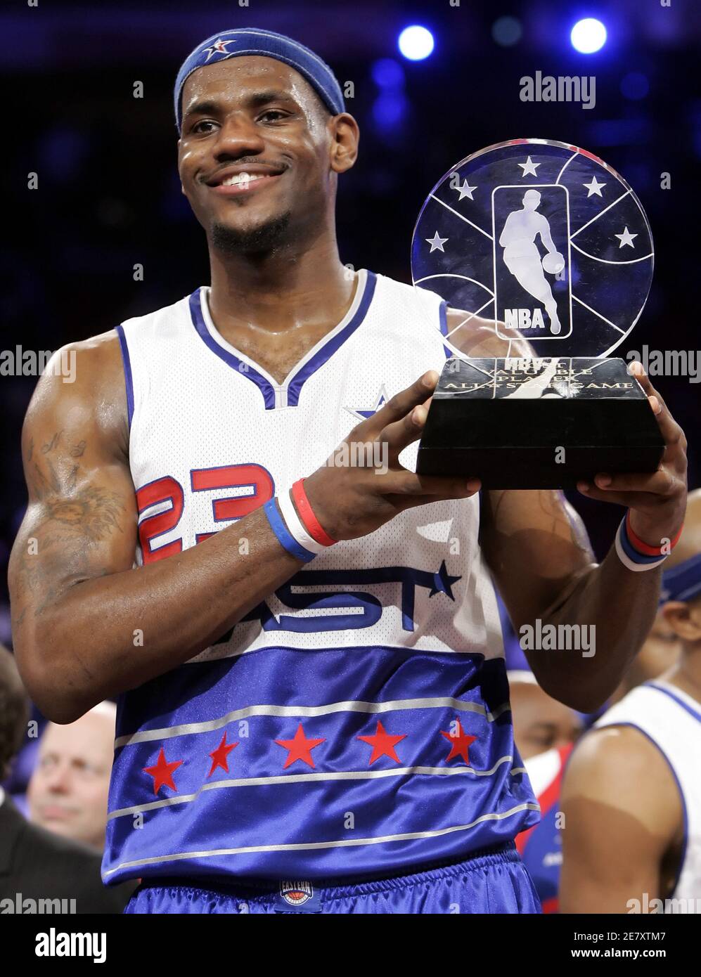 Eastern Conference forward LeBron James holds the Most Valuable Player  trophy at the 55th NBA All-Star Game in Houston, Texas February 19, 2006.  The East defeated the Western Conference 122-120. REUTERS/John Gress