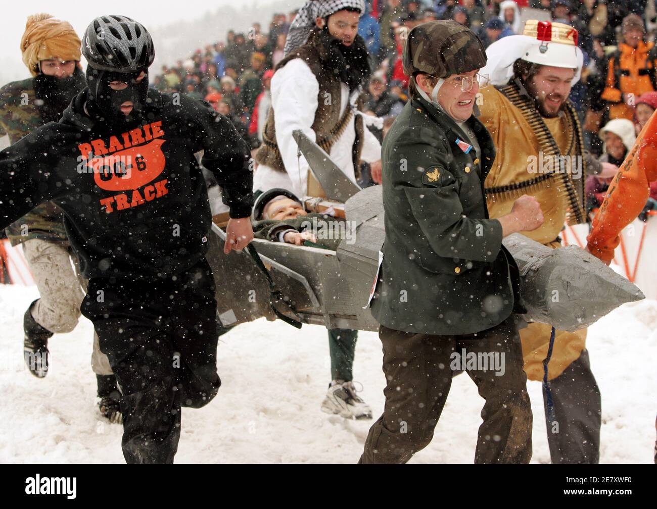 Participants in the coffin races run during the "Frozen Dead Guy Days"  festival in Nederland, Colorado March 10, 2007. "Frozen Dead Guy Days"  commemorates Norwegian Bredo Morstoel who died in 1989 and