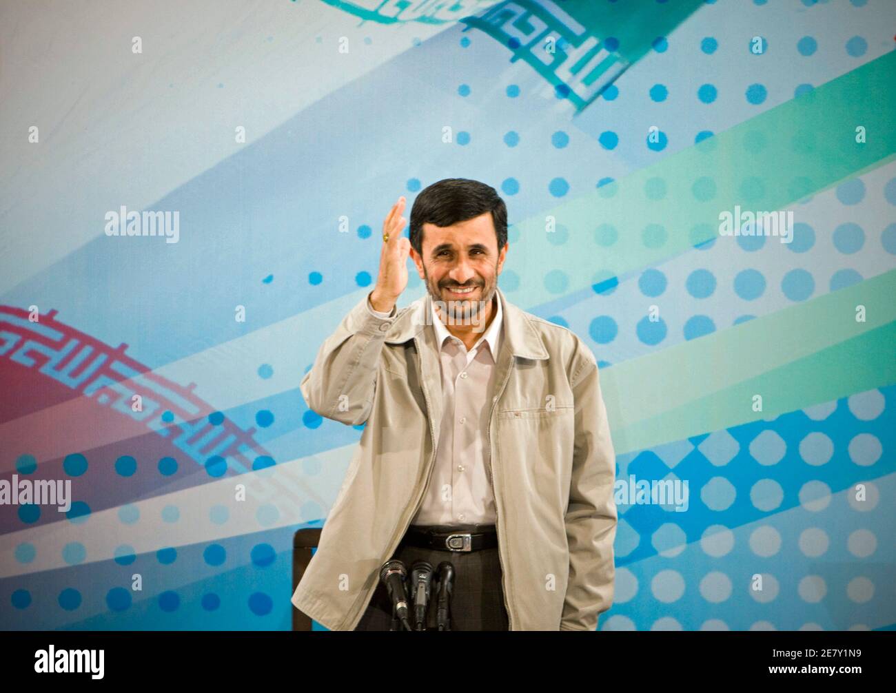 Iran's President Mahmoud Ahmadinejad greets journalists before the start of a news conference in Tehran September 18, 2008. REUTERS/Raheb Homavandi (IRAN) Stock Photo