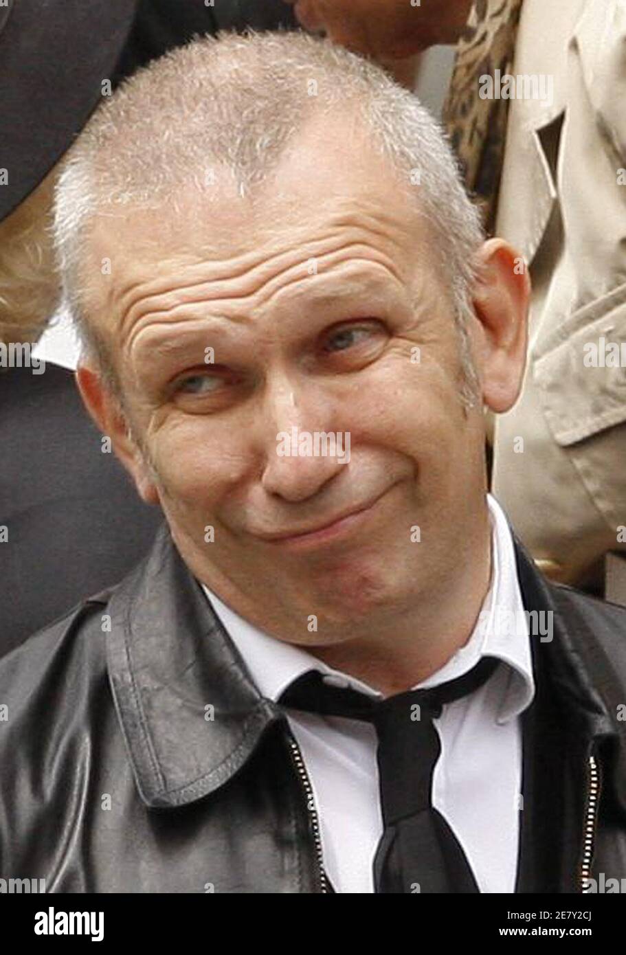 French fashion designer Jean-Paul Gaultier arrives at the funeral service  for late fashion designer Yves Saint Laurent in Paris, June 5, 2008. Saint  Laurent was part of a distinguished line of French