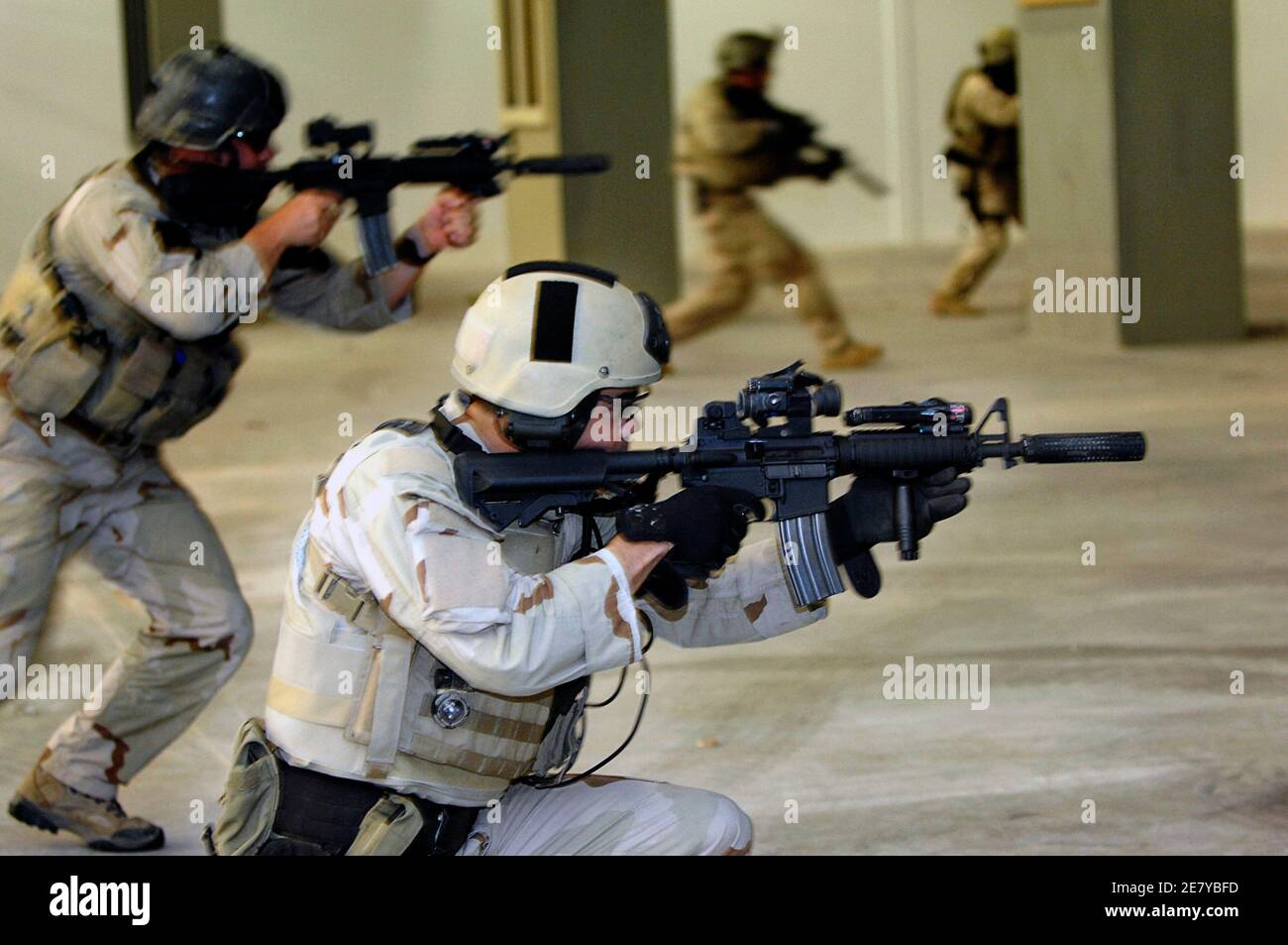 VIRGINIA BEACH, Va. (June 5, 2007) - U.S. Navy SEALs (Sea, Air, Land) perform a live fire exercise for the Secretary of the Navy (SECNAV) The Honorable Dr. Donald C. Winter at the Naval Amphibious Base Little Creek's shooting facility. US Navy SEALs, legendarily tough, secretive specialists, led the bold commando operation in Pakistan that took down the world's most wanted man: 9/11 mastermind Osama bin Laden, US officials said. Photo by US Navy via ABACAPRESS.COM Stock Photo
