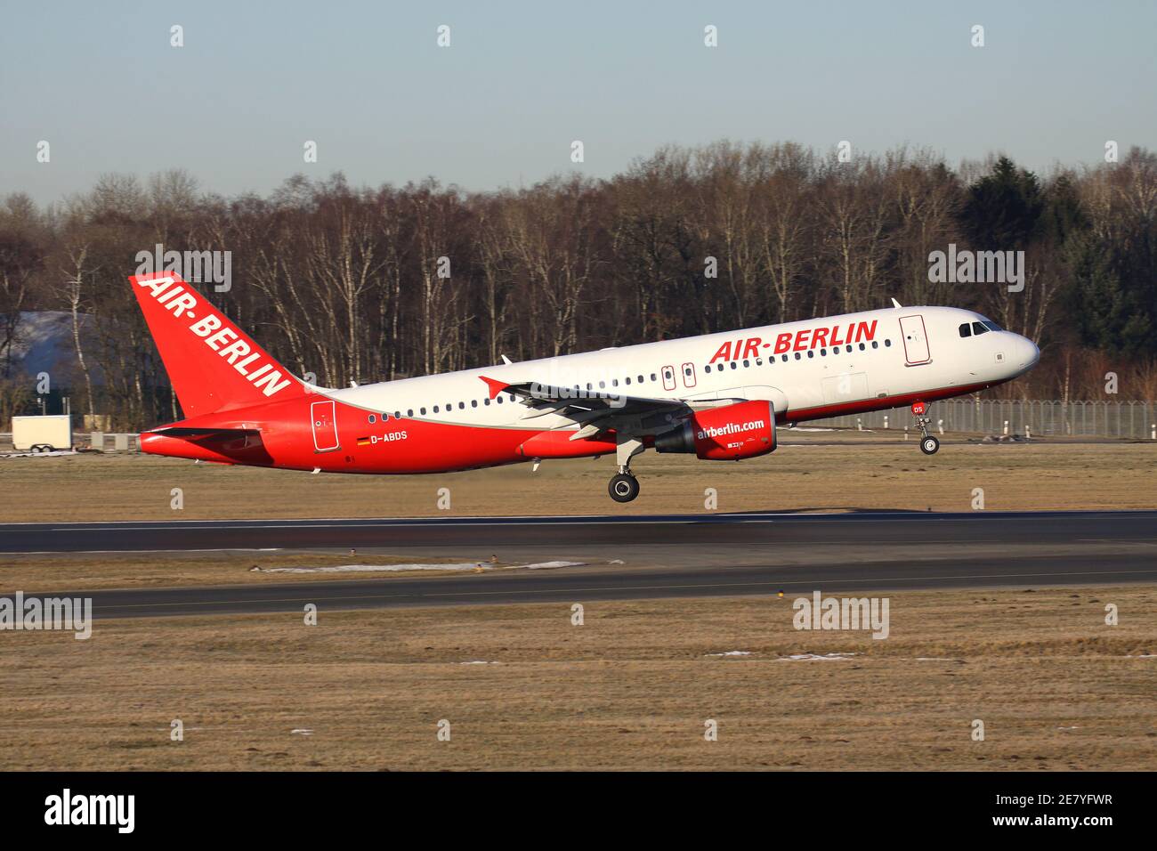 German Air Berlin Airbus A320-200 with registration D-ABDS on take off roll on runway 33 of Hamburg Airport. Stock Photo