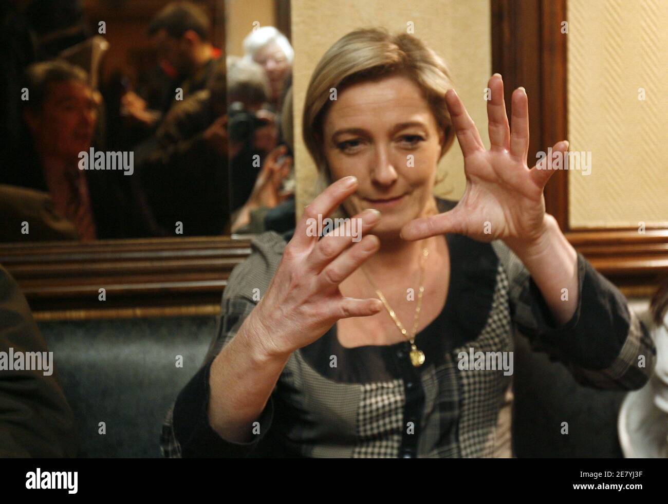Marine Le Pen, daughter of Front National leader and presidential hopeful Jean-Marie Le Pen makes a break in a cafe as she campaigns on a market in Aulnay-sous-Bois, France on April 5, 2007. Photo by Bernard Bisson/ABACAPRESS.COM Stock Photo