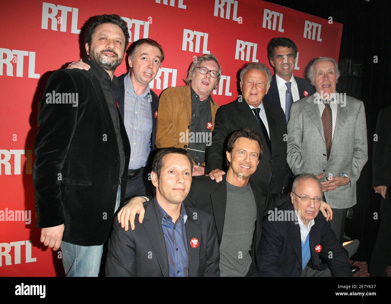 The 'Grosses Tetes' team poses prior to the celebration party of French  radio RTL program 'Les Grosses Tetes' 30th birthday held on the Eiffel  Tower first floor in Paris, France on april