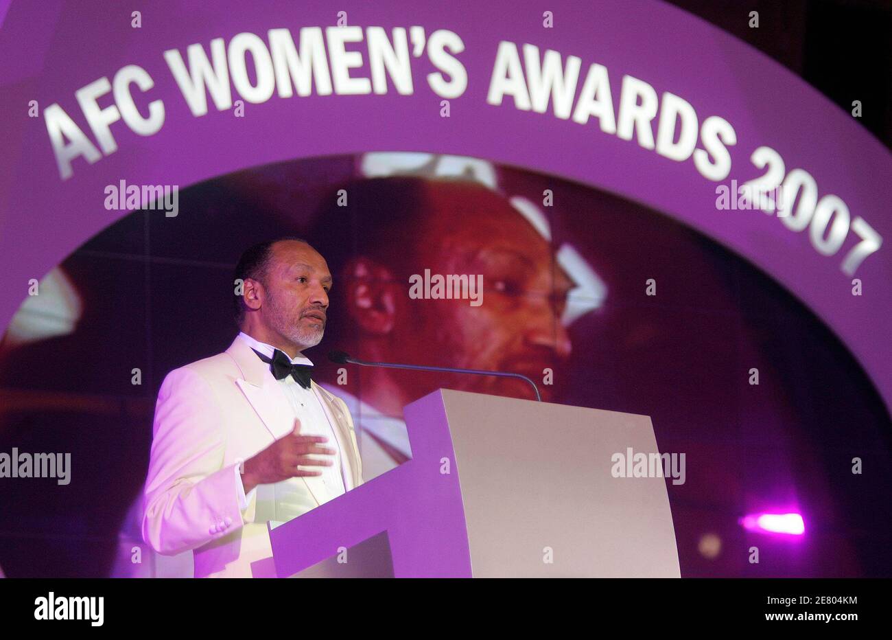 Asian Football Confederation (AFC) President Mohamed Bin Hammam delivers his speech during AFC Women's Player of the Year awards in Kuala Lumpur November 6, 2007. REUTERS/Zainal Abd Halim (MALAYSIA) Stock Photo