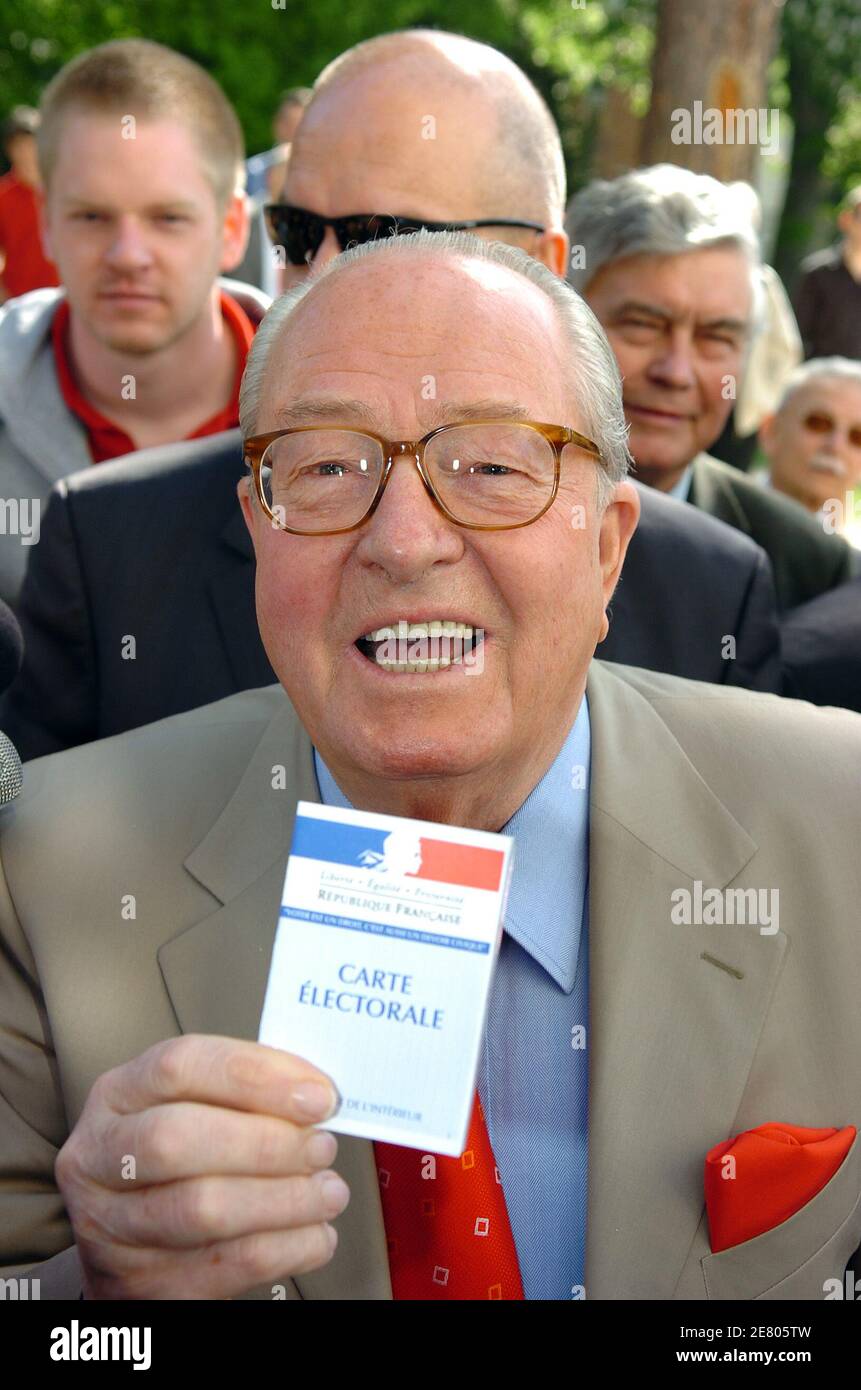 Far-right National Front leader and candidate Jean-Marie Le Pen answers the  medias after he casts his ballot at a polling station in Saint-Cloud, on  April 22, 2007, for the first round of