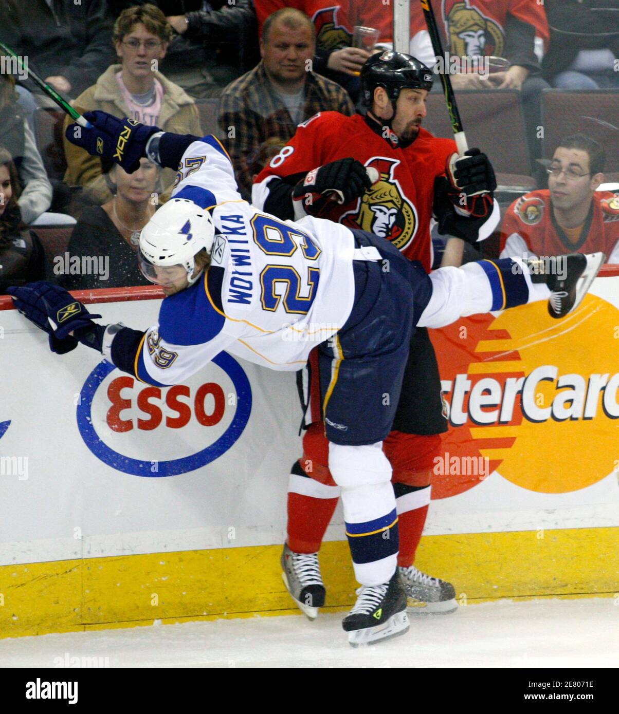 St. Louis Blues Jeff Woywitka (L) collides with Ottawa Senators Martin Lapointe during the first period of their NHL hockey game in Ottawa March 20, 2008.       REUTERS/Chris Wattie       (CANADA) Stock Photo