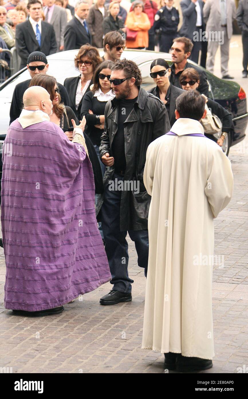 French actor Vincent Cassel along with Italian actress Monica Bellucci  arrive to the funeral service for his father French actor Jean-Pierre Cassel  at Saint-Eustache church in Paris, France on April 26, 2007.