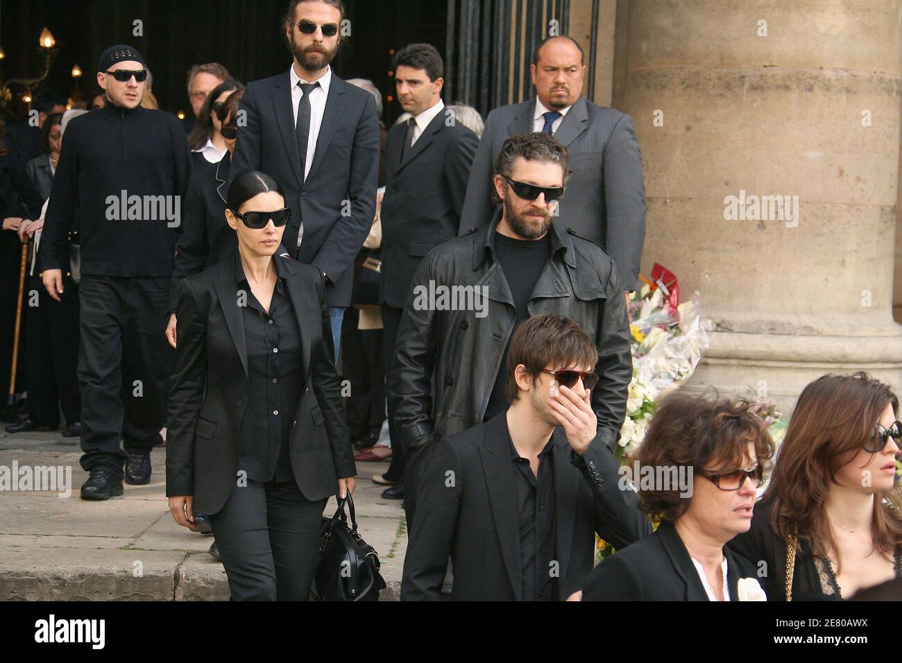 Anne and Cecile Cassel, Gaspard Ulliel, Monica Bellucci and Vincent and  Mathias Cassel and Mathias Cassel leave the funeral service for French  actor Jean-Pierre Cassel at Saint-Eustache church in Paris, France on