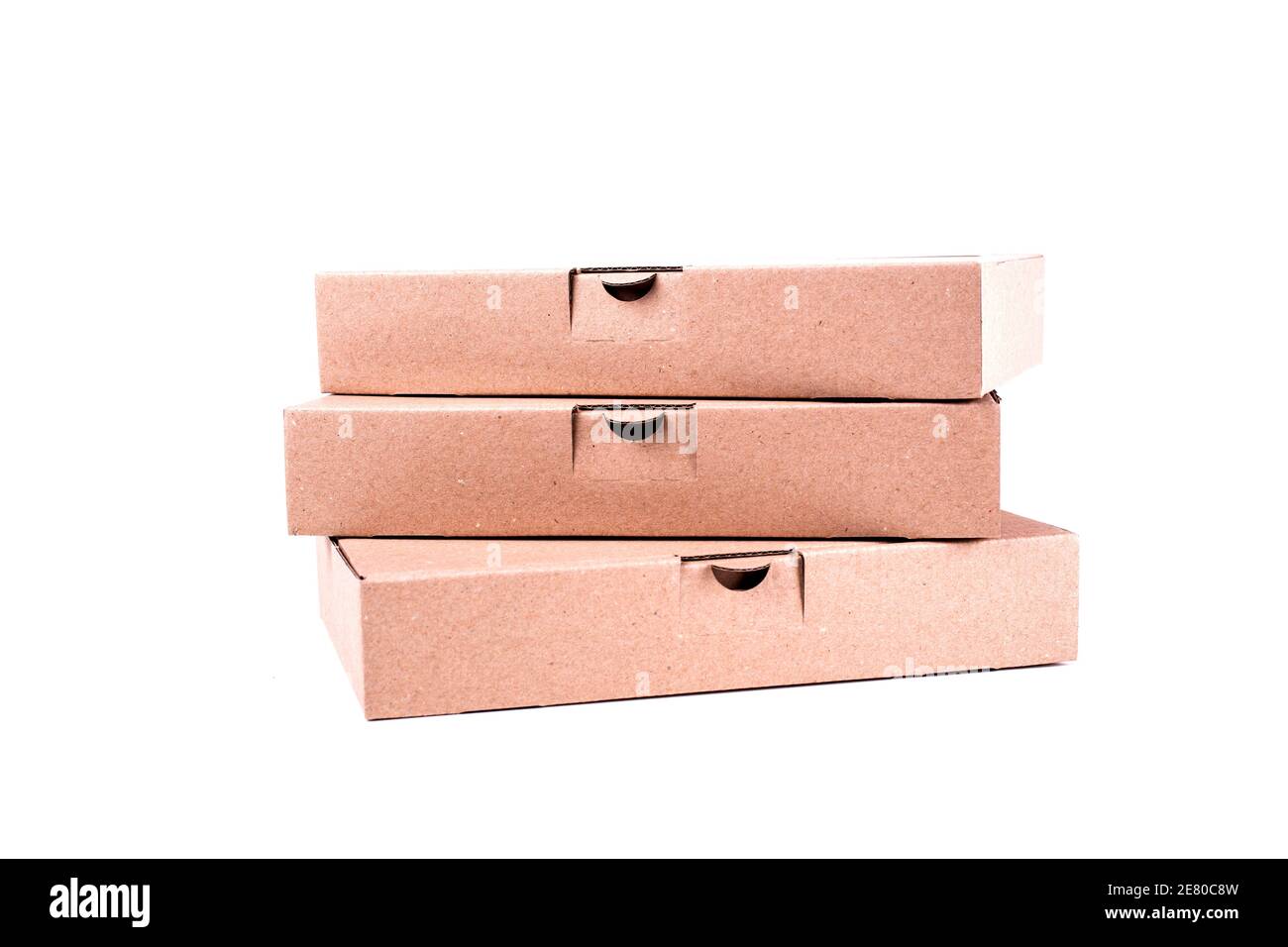Closeup of Flat cardboard boxes isolated on white Stock Photo Alamy