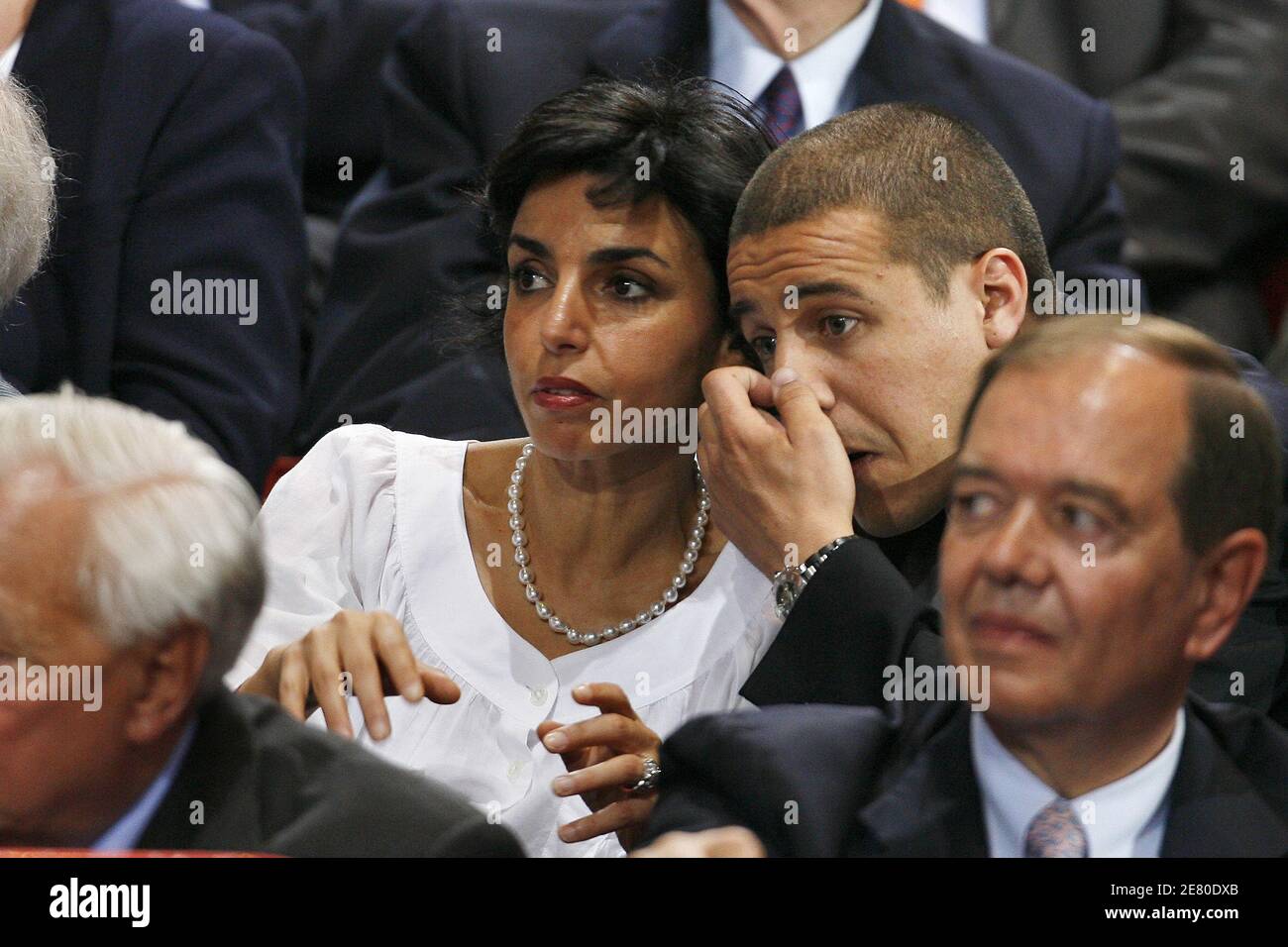 'Rachida Dati and singer Faudel are seen listening to Presidential frontrunner Nicolas Sarkozy adressing tens of thousands of supporters at Paris Bercy concert hall in Paris, France, April 29, 2007. Sarkozy went on the offensive Sunday, charging that he had been unjustly depicted as authoritarian as the battle for the Elysee entered its final week. The rightwinger said he had suffered ''personal attacks'' during the campaign that had targeted his ''honour, sincerity, personality and character.'' Photo By Bisson-Taamallah-Orban/ABACAPRESS.COM' Stock Photo