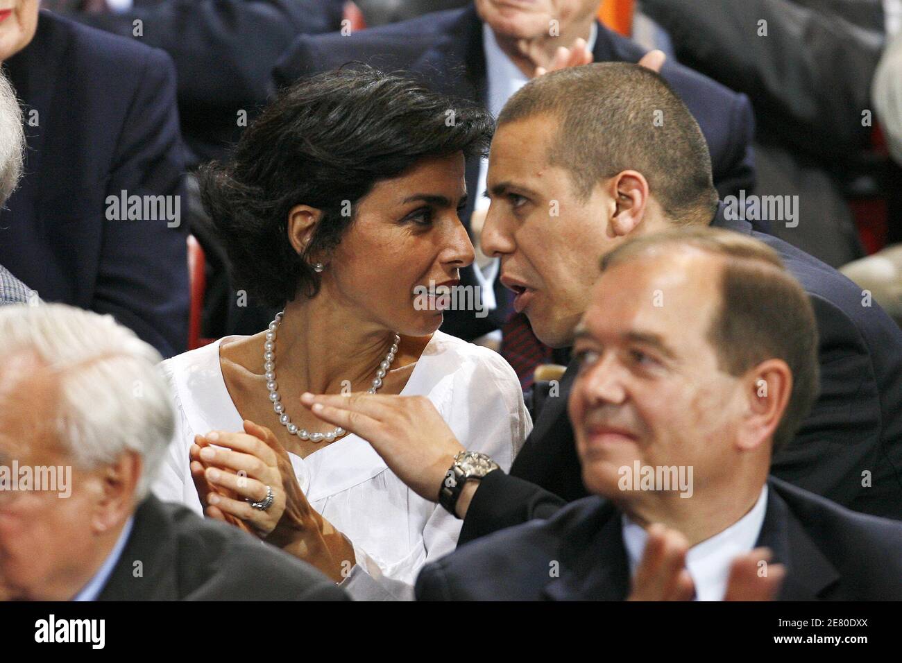 'Rachida Dati and singer Faudel are seen listening to Presidential frontrunner Nicolas Sarkozy adressing tens of thousands of supporters at Paris Bercy concert hall in Paris, France, April 29, 2007. Sarkozy went on the offensive Sunday, charging that he had been unjustly depicted as authoritarian as the battle for the Elysee entered its final week. The rightwinger said he had suffered ''personal attacks'' during the campaign that had targeted his ''honour, sincerity, personality and character.'' Photo By Bisson-Taamallah-Orban/ABACAPRESS.COM' Stock Photo
