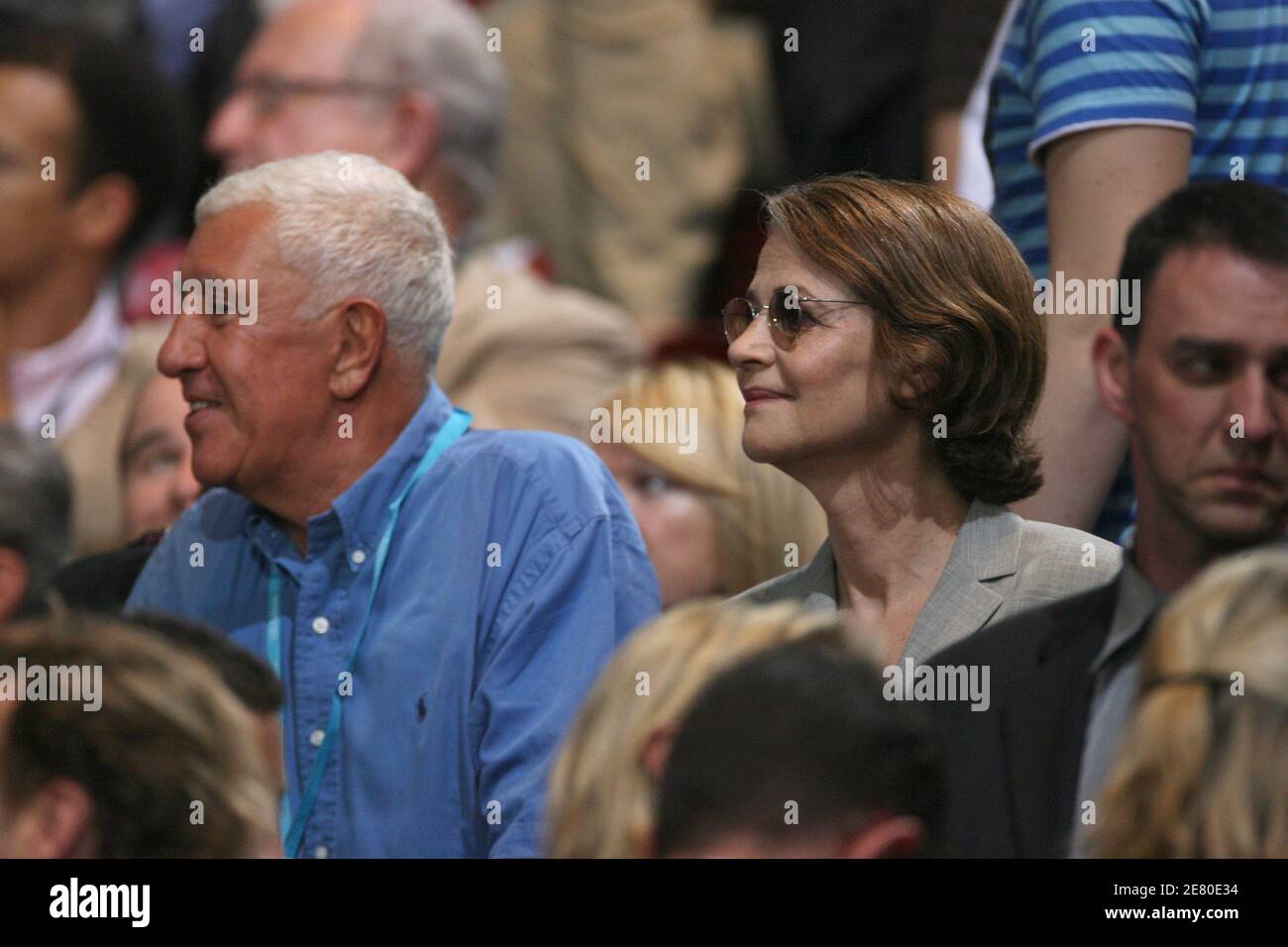 'Stephane Collaro and Charlotte Rampling are seen listening to Presidential frontrunner Nicolas Sarkozy adressing tens of thousands of supporters at Paris Bercy concert hall in Paris, France, April 29, 2007. Sarkozy went on the offensive Sunday, charging that he had been unjustly depicted as authoritarian as the battle for the Elysee entered its final week. The rightwinger said he had suffered ''personal attacks'' during the campaign that had targeted his ''honour, sincerity, personality and character.'' Photo By Bisson-Taamallah-Orban/ABACAPRESS.COM' Stock Photo