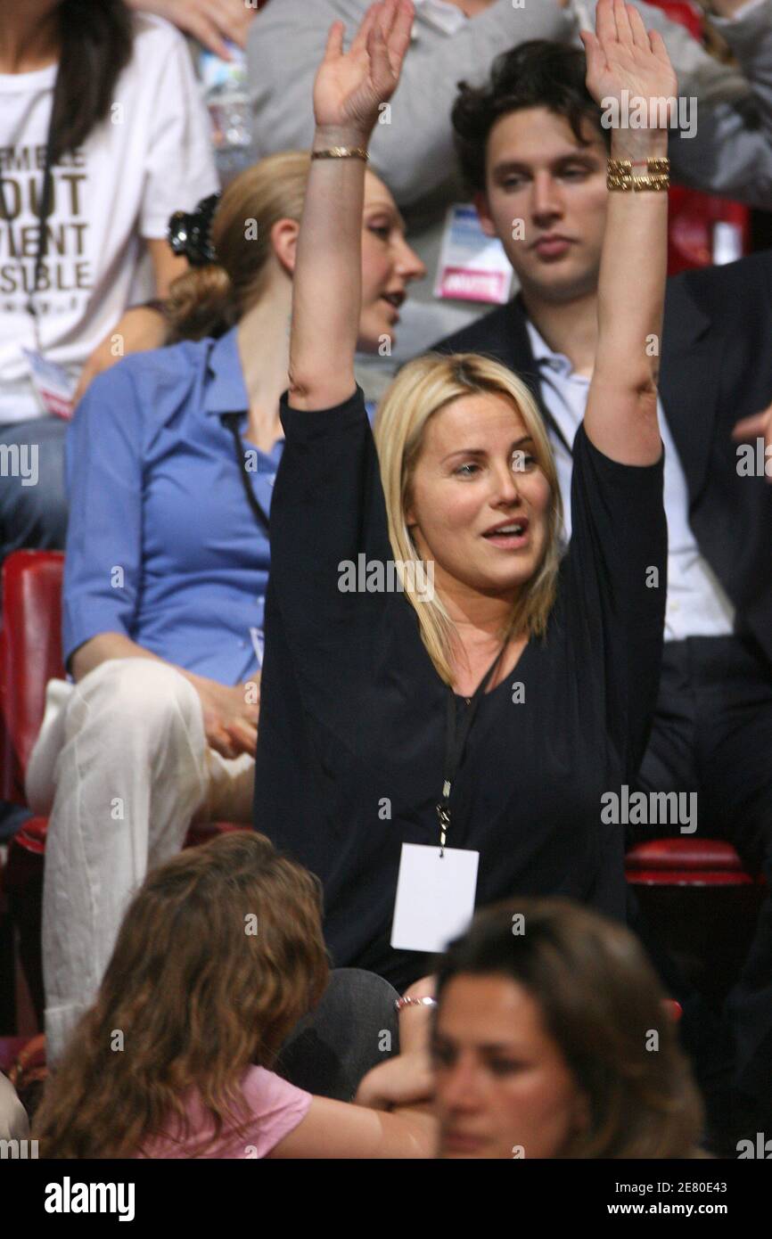 'Sophie Favier is seen listening to Presidential frontrunner Nicolas Sarkozy adressing tens of thousands of supporters at Paris Bercy concert hall in Paris, France, April 29, 2007. Sarkozy went on the offensive Sunday, charging that he had been unjustly depicted as authoritarian as the battle for the Elysee entered its final week. The rightwinger said he had suffered ''personal attacks'' during the campaign that had targeted his ''honour, sincerity, personality and character.'' Photo By Bisson-Taamallah-Orban/ABACAPRESS.COM' Stock Photo