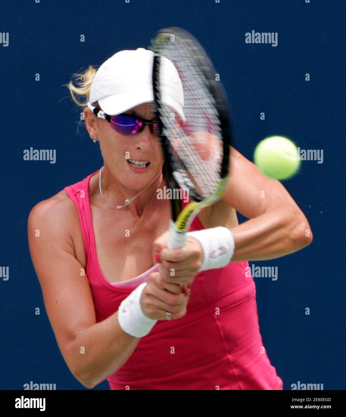 Anastasia Rodionova of Australia returns a shot to Alisa ...