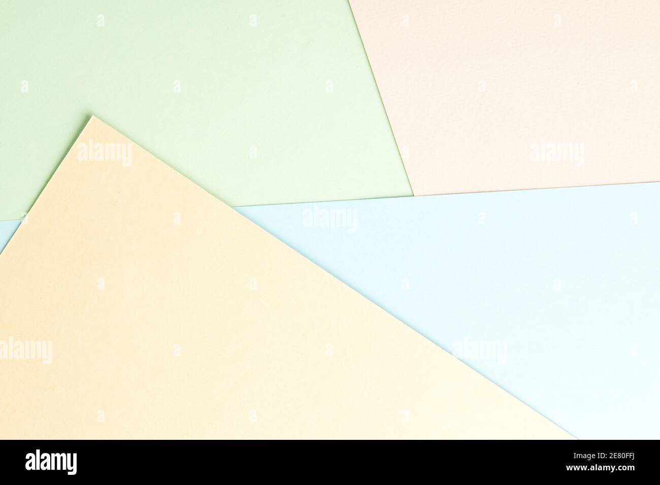 abstract pastel color paper flat lay background. minimal composition with diagonal geometric lines. light romance backdrop Stock Photo