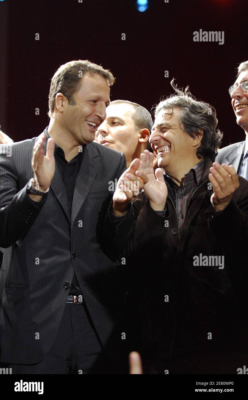 TV presenter Arthur and actor Christian Clavier pictured on stage with  Nicolas Sarkozy's supporters, Place de la Concorde in Paris, France, May 6,  2007. French voters elected reform-minded Nicolas Sarkozy as their