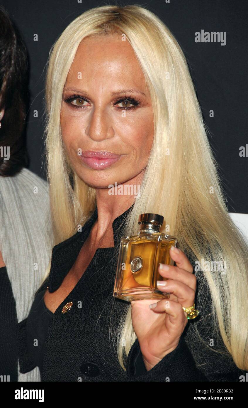 Donatella Versace holds up her new fragrance, Versace, at Saks Fifth Avenue  in New York City on May 8, 2007. (UPI Photo/John Angelillo Stock Photo -  Alamy