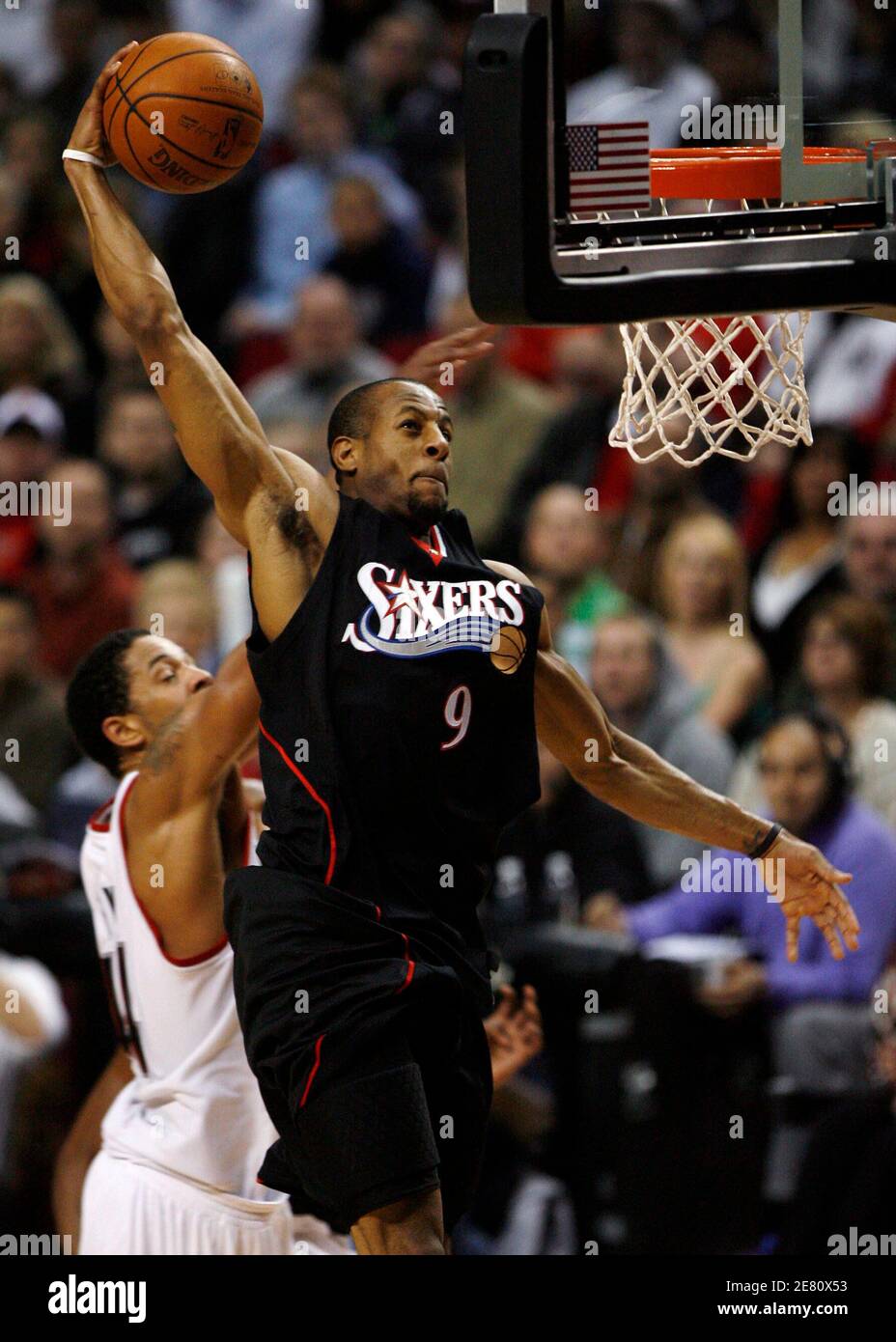 Philadelphia 76ers Guard Andre Iguodala 9 Goes Up For A Slam Dunk As Portland Trail Blazers Forward Channing Frye L Defends During Fourth Quarter Nba Basketball Action In Portland Oregon December 30 Philadelphia 76ers Guard Andre Iguodala 9 Goes Up For A Slam Dunk As Portland Trail Blazers Forward Channing Frye L Defends During Fourth Quarter Nba Basketball Action In Portland Oregon December 30