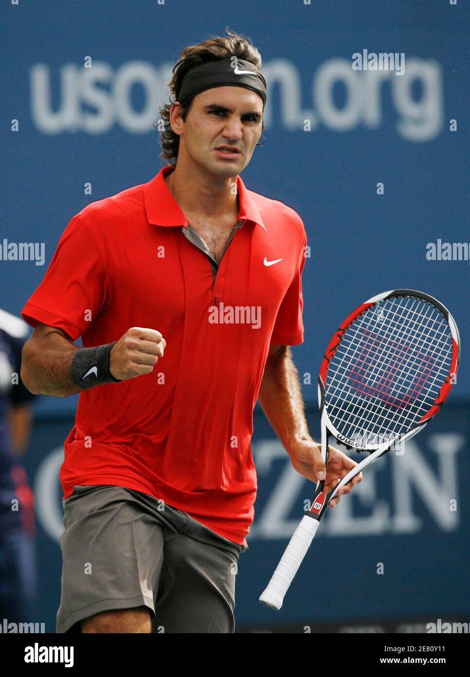 Roger Federer of Switzerland pumps his fist after a point against Thiago  Alves of Brazil during their match at the U.S. Open tennis tournament at  Flushing Meadows in New York, August 29,