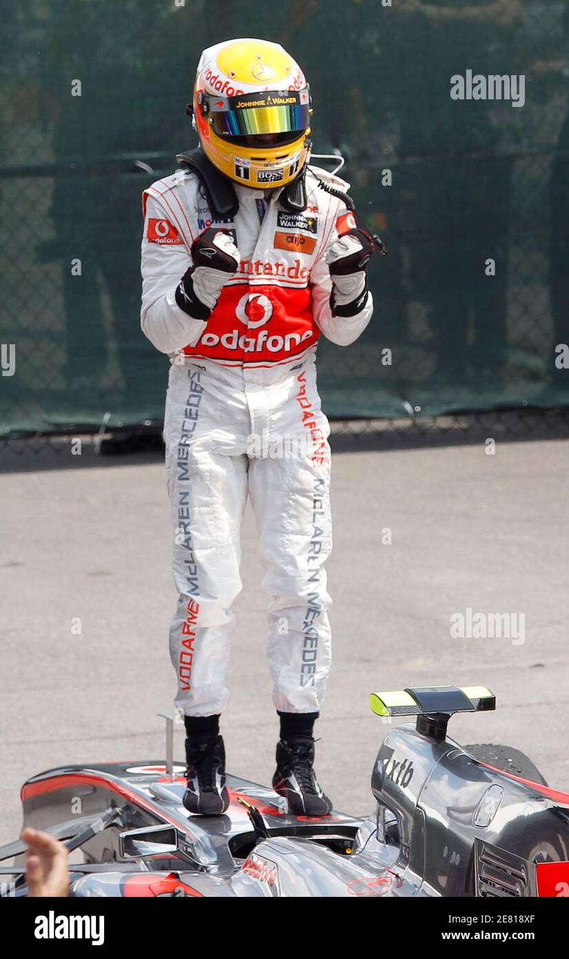 McLaren Formula One driver Lewis Hamilton of Britain celebrates after winning the Canadian F1 Grand Prix in Montreal June 13, 2010.         REUTERS/Chris Wattie (CANADA - Tags: SPORT MOTOR RACING) Stock Photo