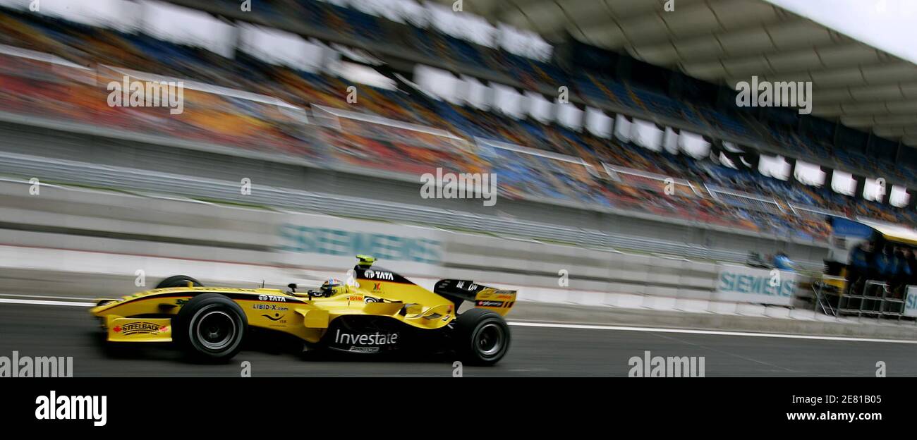 Jordan driver Nicolas Kiesa of Denmark drives in the pit during a free  practice session at Istanbul Park race track in Istanbul, the venue of  Turkey's first ever Formula One race, August