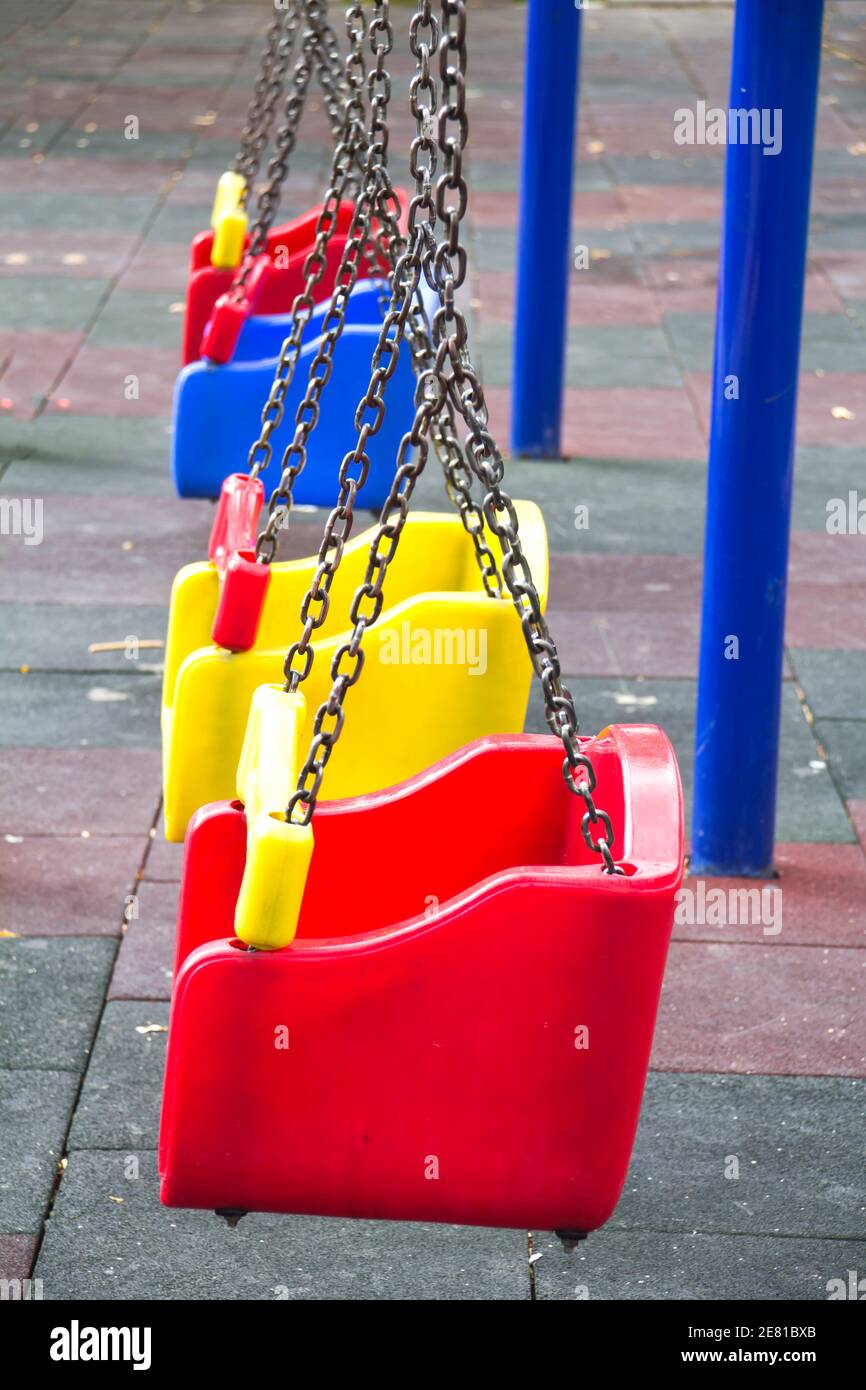 Close up of swing in playground Stock Photo