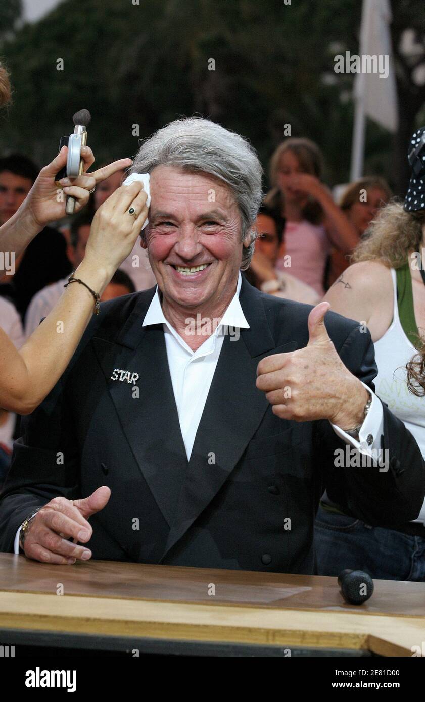 French movie legend Alain Delon has a little make-up fix during Canal + TV  Show 'Le Grand Journal' during the 60th International Film Festival in  Cannes, France on May 21, 2007. The