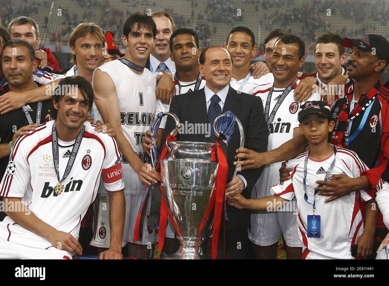 AC Milan's players with Milan's president Silvio Berlusconi celebrate with  the trophy during the UEFA Champions League Final, AC Milan v Liverpool at  Olympic Stadium, in Athens, Greece, on May 23, 2007.