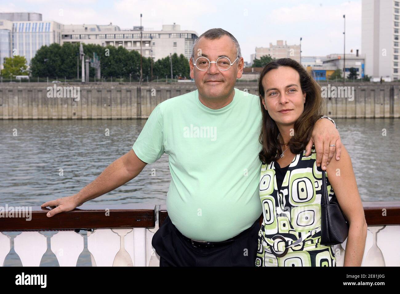 French humorist Jean Roucas and his wife attend the Tennesse cruse in  Paris, France, on May 23, 2007. This party is each year organized by 'Louis  Carlesimo' caritative association to enjoy seriously