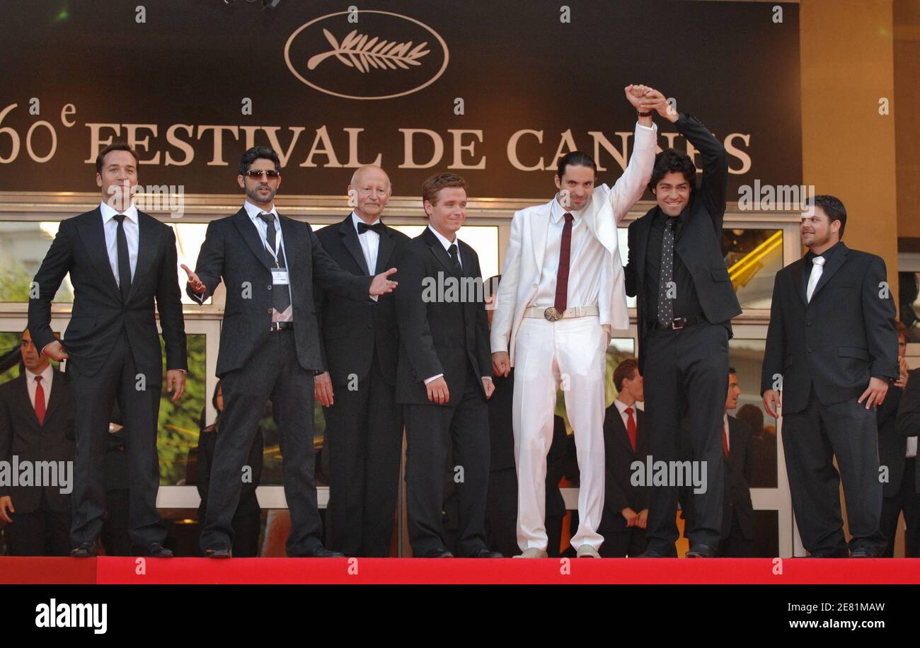 President of Cannes Film Festival Gilles Jacob (3rd L) and members of the cast of 'Entourage' including Kevin Connolly (C), Adrian Grenier (2nd R) and Jerry Ferrara (R) pose for the photographers while filming a scene for the HBO serie 'Entourage', on top of the Palais des Festivals during the 60th International Film Festival in Cannes, France, on May 24, 2007. Photo by Hahn-Nebinger-Orban/ABACAPRESS.COM Stock Photo