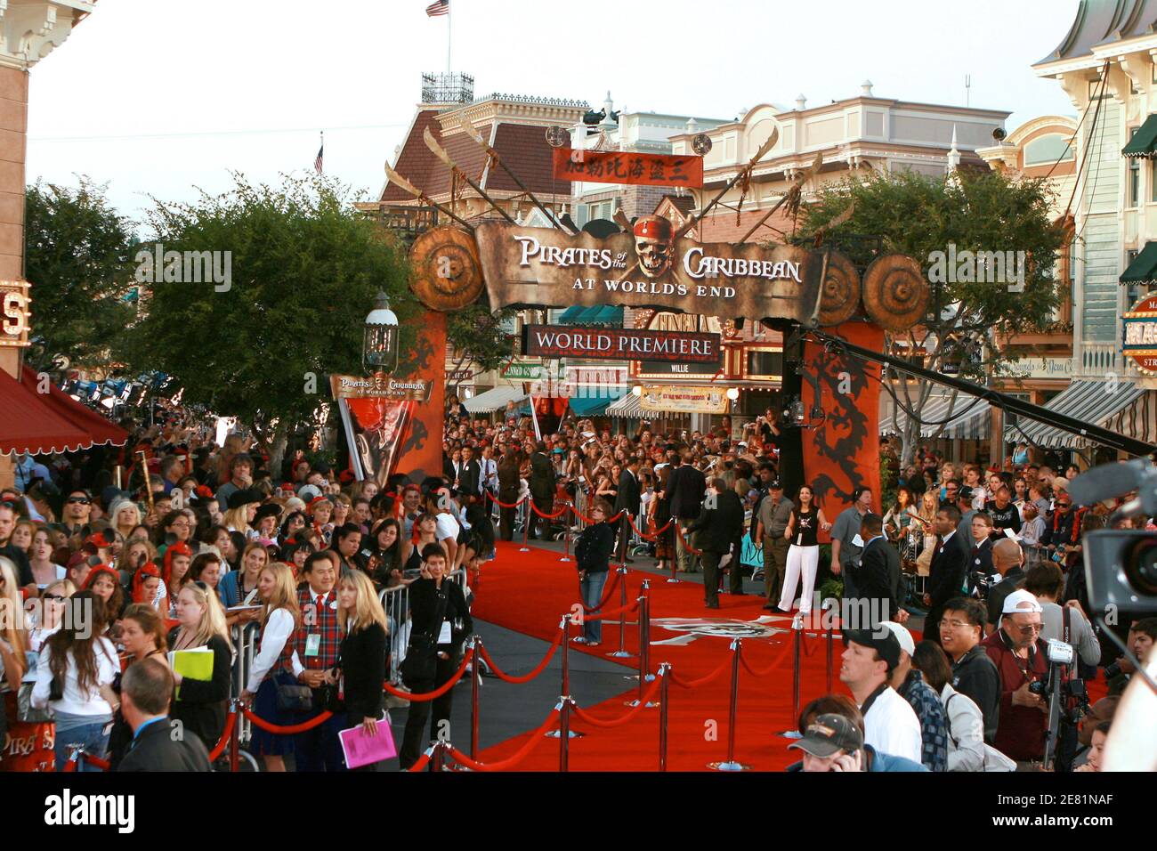 Authentic street scene of Walt Disney Studios, Burbank, capturing the atmosphere of a film premiere with red carpet and crowd