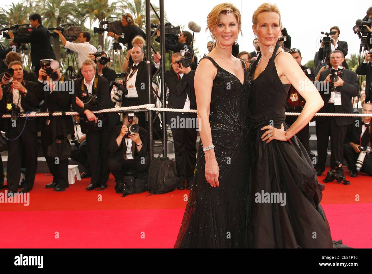 French actress and producer Michele Laroque (L) and French model