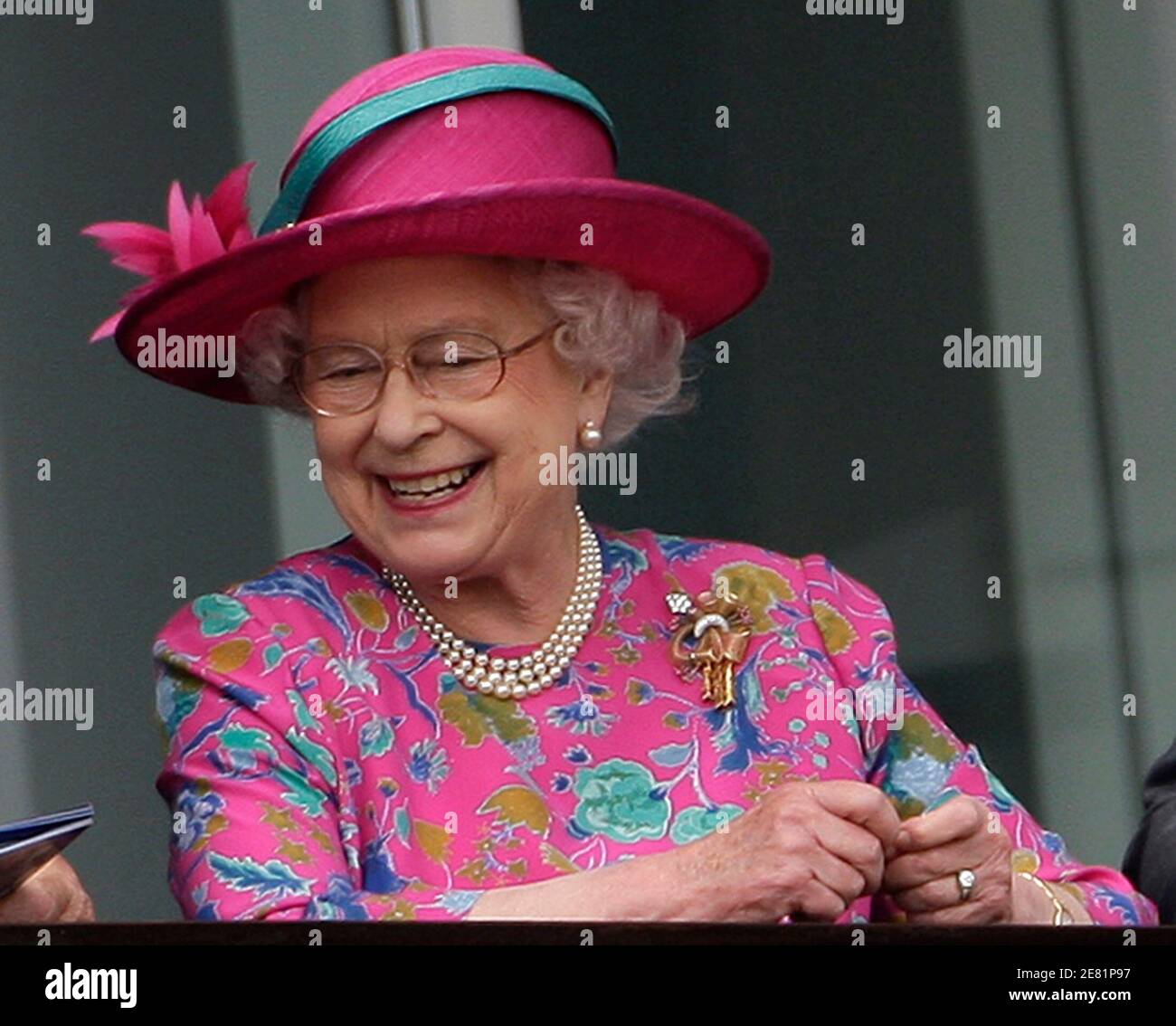 Britain's Queen Elizabeth watches during the Epsom Derby Festival at Epsom Downs in Surrey, southern England June 7, 2008.    REUTERS/Darren Staples   (BRITAIN) Stock Photo