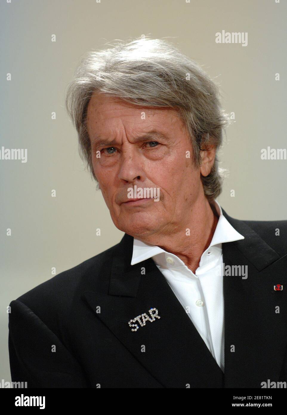 'French actor Alain Delon to delivers a speech during the Closing ceremony of the 60th edition of the Cannes Film Festival at the Festival Palace in Cannes, southern France on May 27, 2007. A harrowing Romanian film won Cannes' top prize late 27 May as the world's biggest film festival brought the curtain down on a 12-day run remarkable for its star-studded brightness -- and the death-obsessed darkness of its movies. ''4 Months, 3 Weeks and 2 Days'' elbowed aside 21 other films to snatch the golden trophy at a glittering ceremony marking the end of the festival's 60th edition. Photo by Hahn-Ne Stock Photo